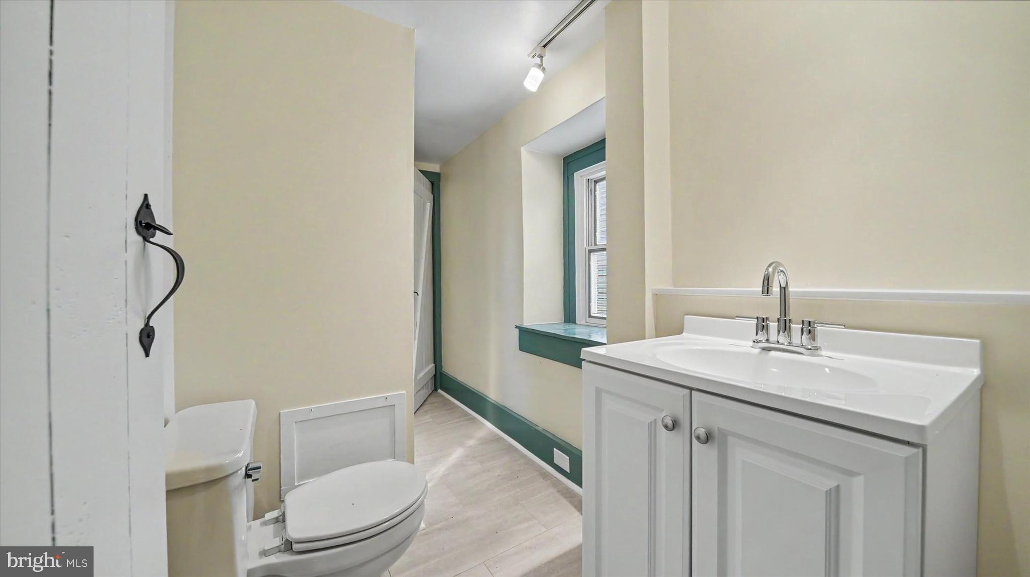 4037 Grande View Drive Pylesville, MD 21132 - Photo 35 of 74 a bathroom with a sink a toilet and shower