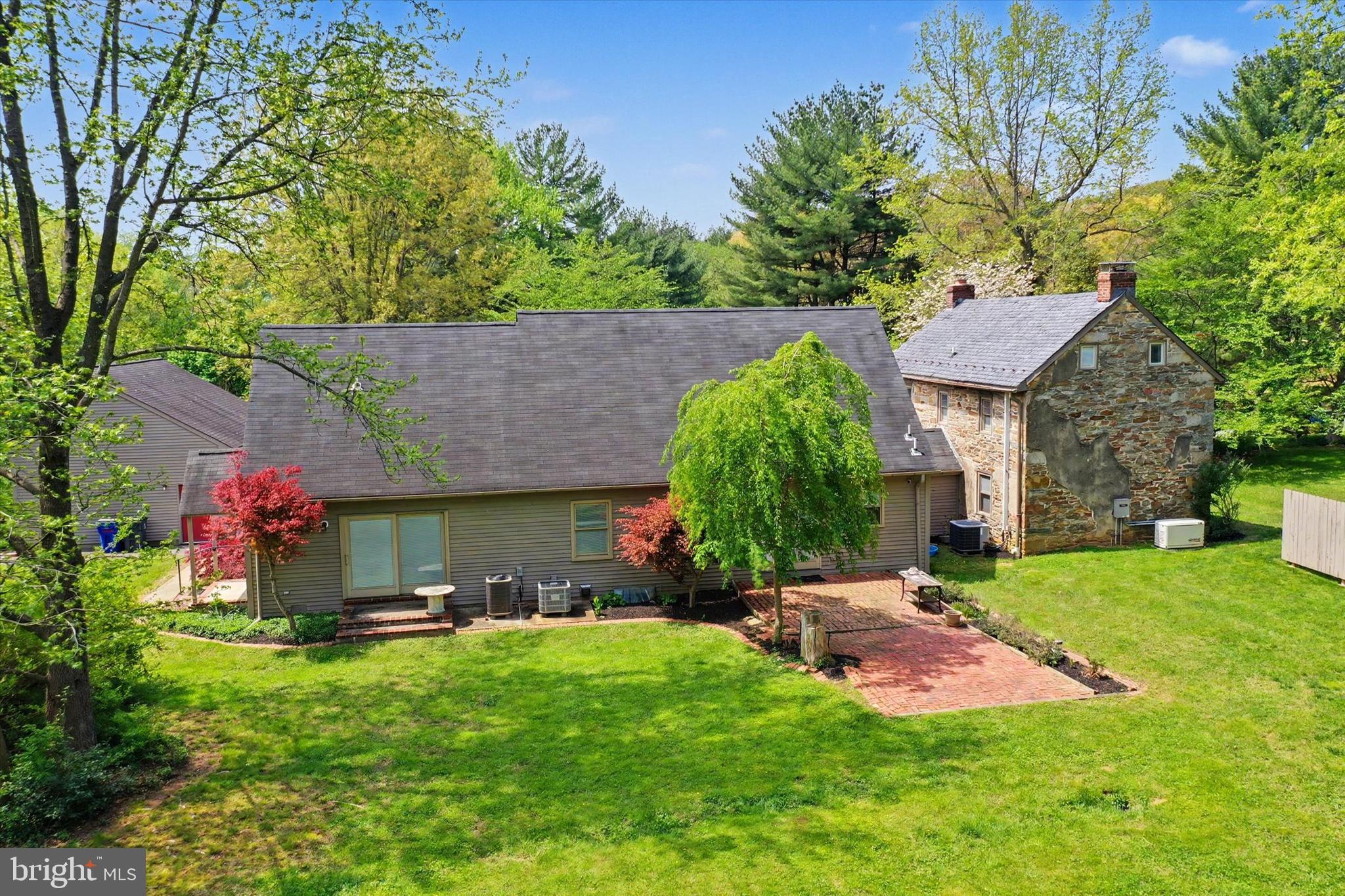 4037 Grande View Drive Pylesville, MD 21132 - Photo 4 of 74 a front view of a house with a yard and tree s