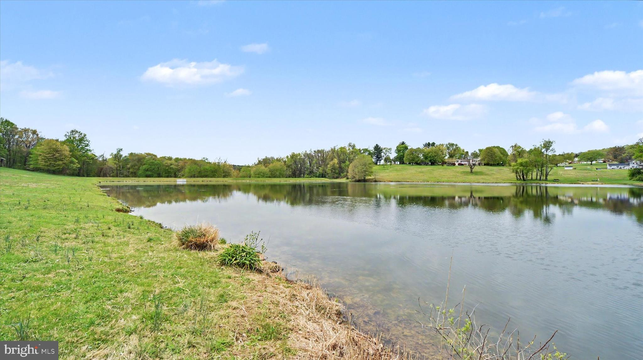 4037 Grande View Drive Pylesville, MD 21132 - Photo 50 of 74 a view of a lake with houses in the back