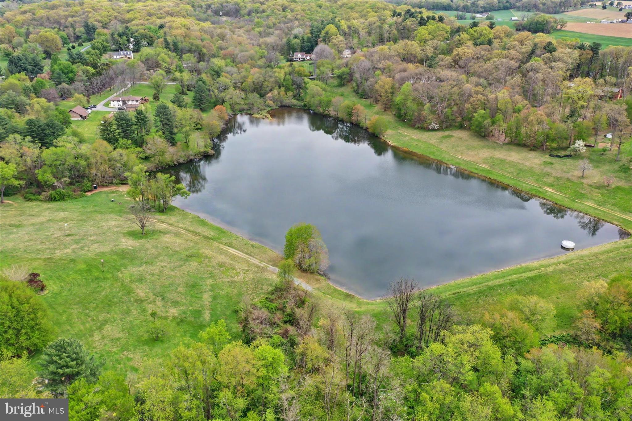 4037 Grande View Drive Pylesville, MD 21132 - Photo 61 of 74 an aerial view of a house with a yard and lake view