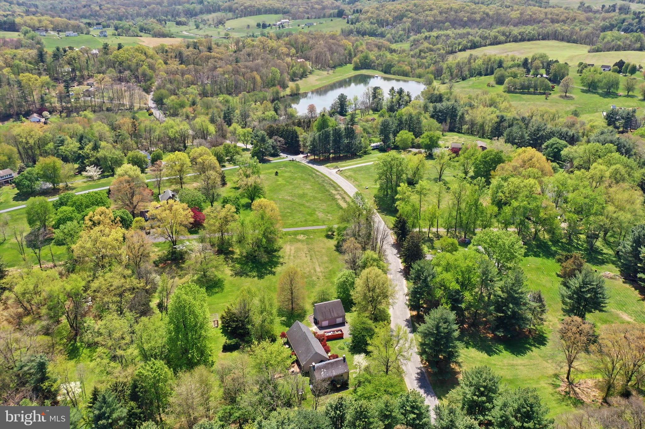 4037 Grande View Drive Pylesville, MD 21132 - Photo 67 of 74 an aerial view of residential houses with outdoor space and trees