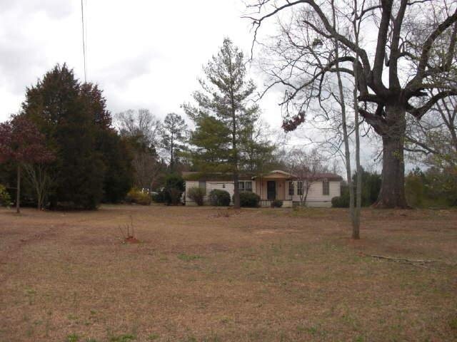 1454 Hog Mountain Road Winder, GA 30680 - Photo 1 of 1 a view of a house with a snow in the yard