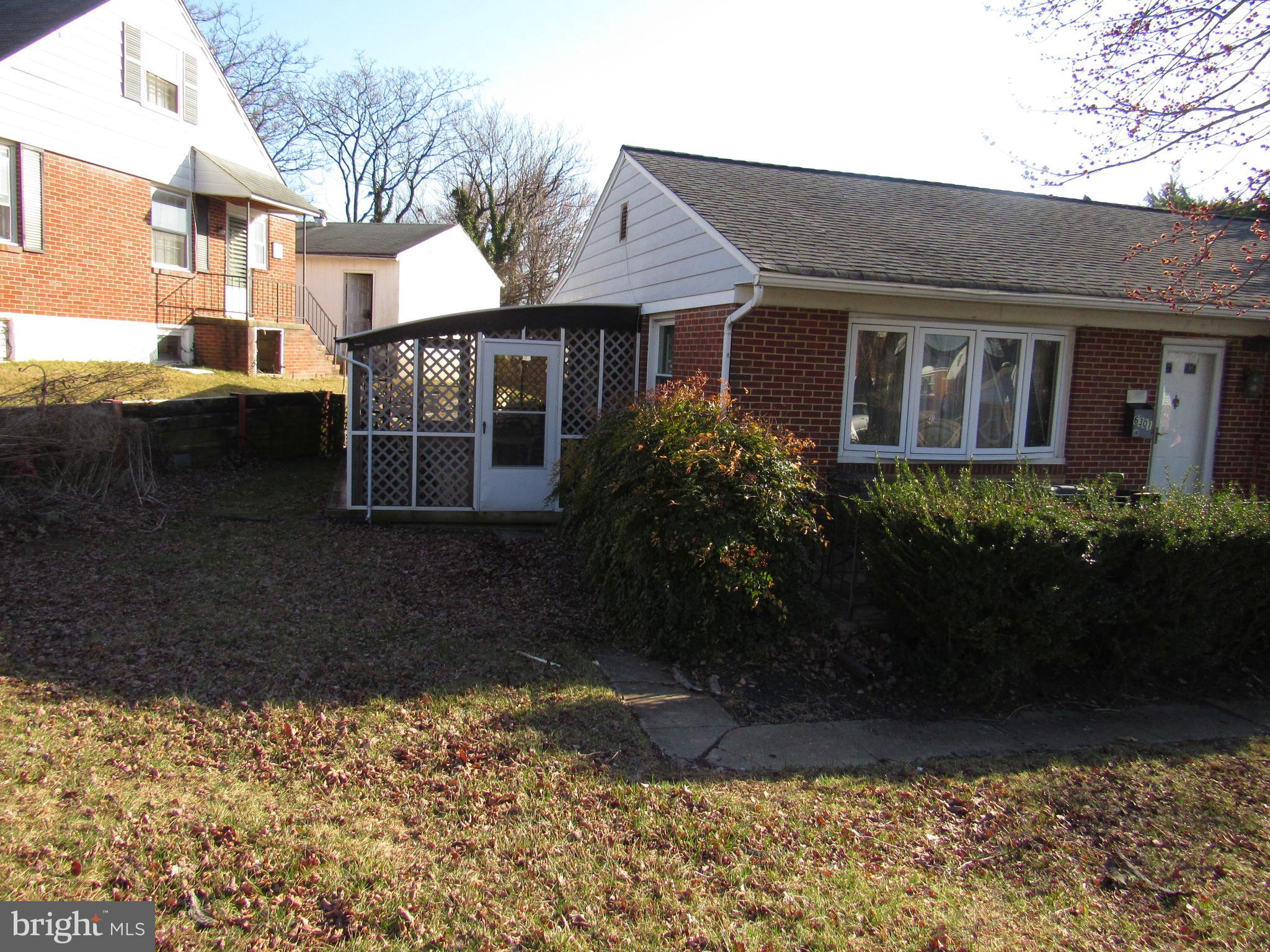 6301 Fieldvale Road Baltimore, MD 21237 - Photo 13 of 28 a front view of a house with garden