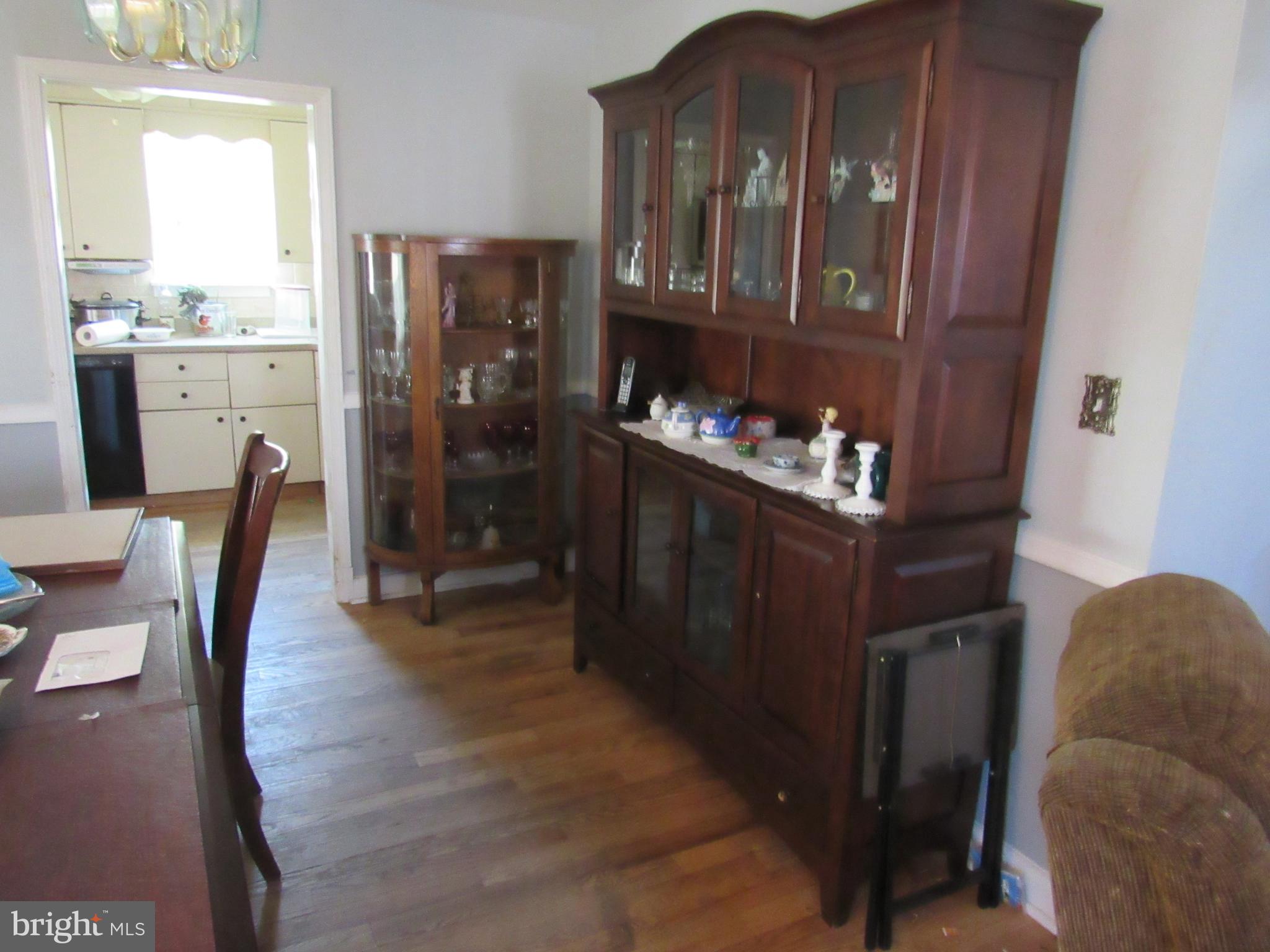 6301 Fieldvale Road Baltimore, MD 21237 - Photo 15 of 28 a dining room with furniture and window