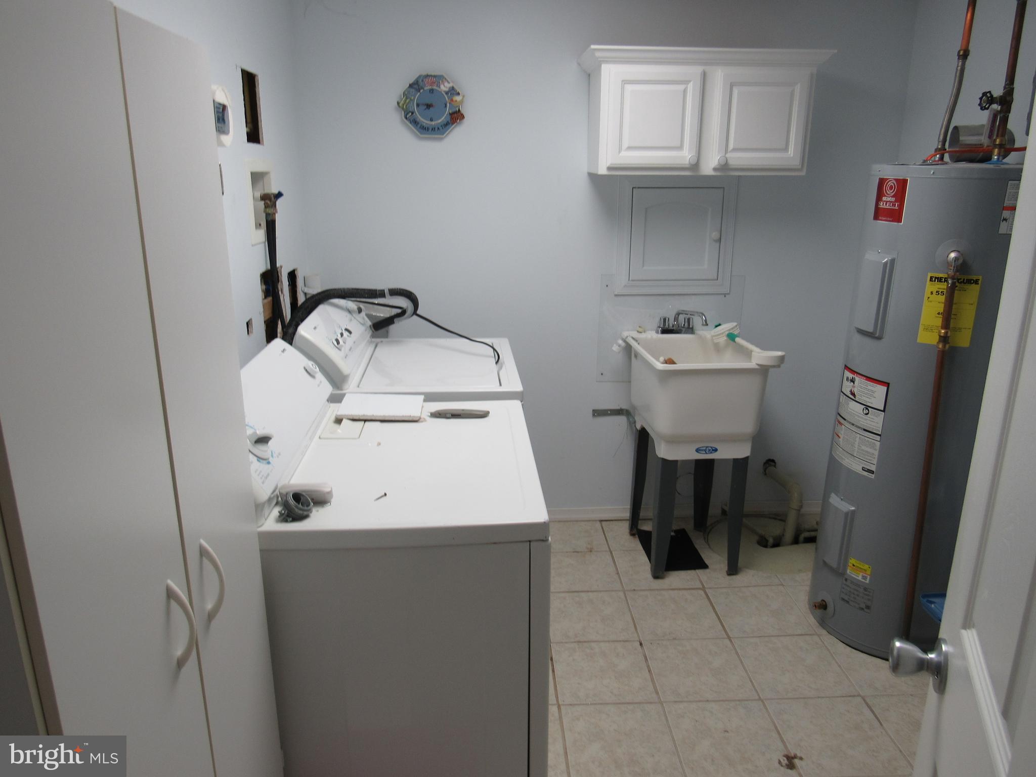 6301 Fieldvale Road Baltimore, MD 21237 - Photo 28 of 28 a utility room with dryer and washer
