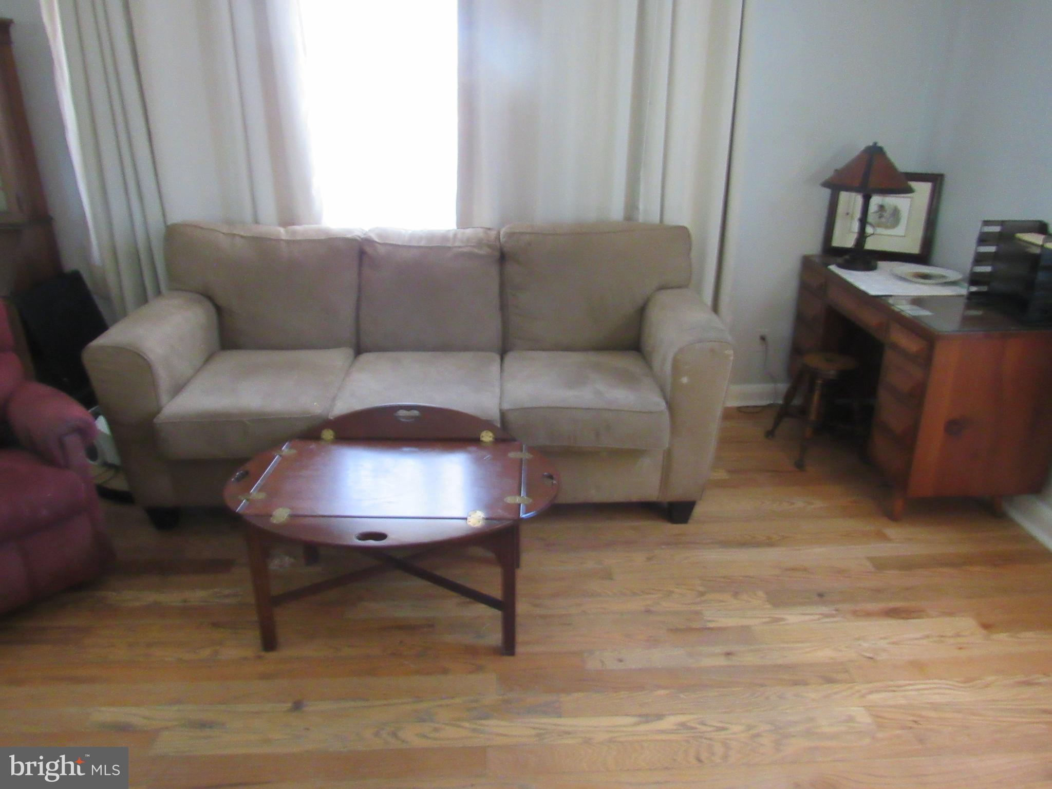 6301 Fieldvale Road Baltimore, MD 21237 - Photo 5 of 28 a living room with furniture and a window