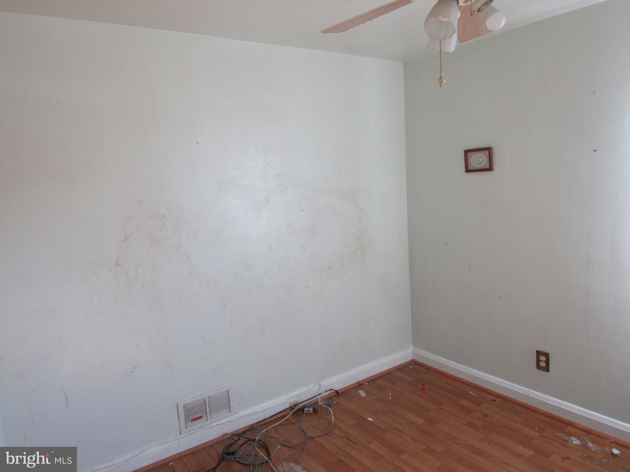 6301 Fieldvale Road Baltimore, MD 21237 - Photo 7 of 28 a view of a room with wooden floor