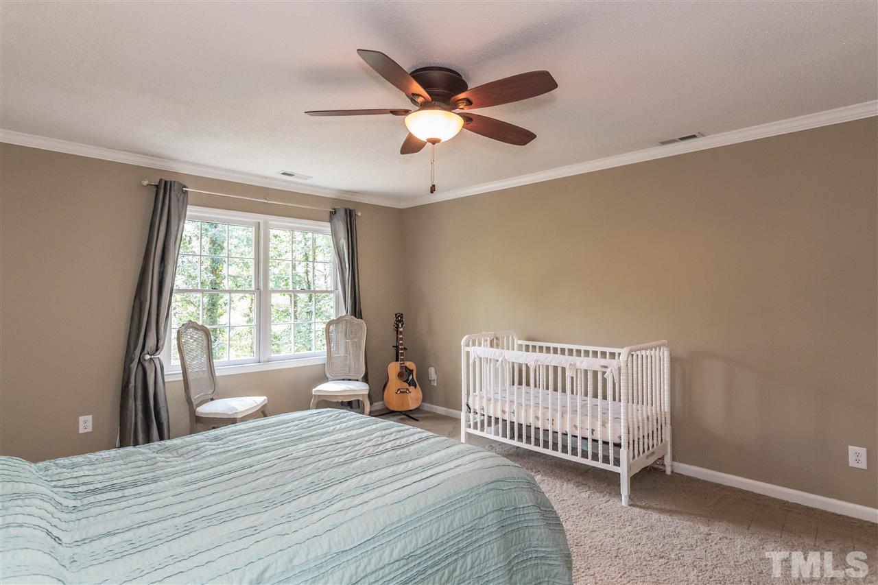 4546 Malvern Road Durham, NC 27707 - Photo 12 of 20 A master bedroom worthy of its name. Spacious with crown molding including his and hers closets.