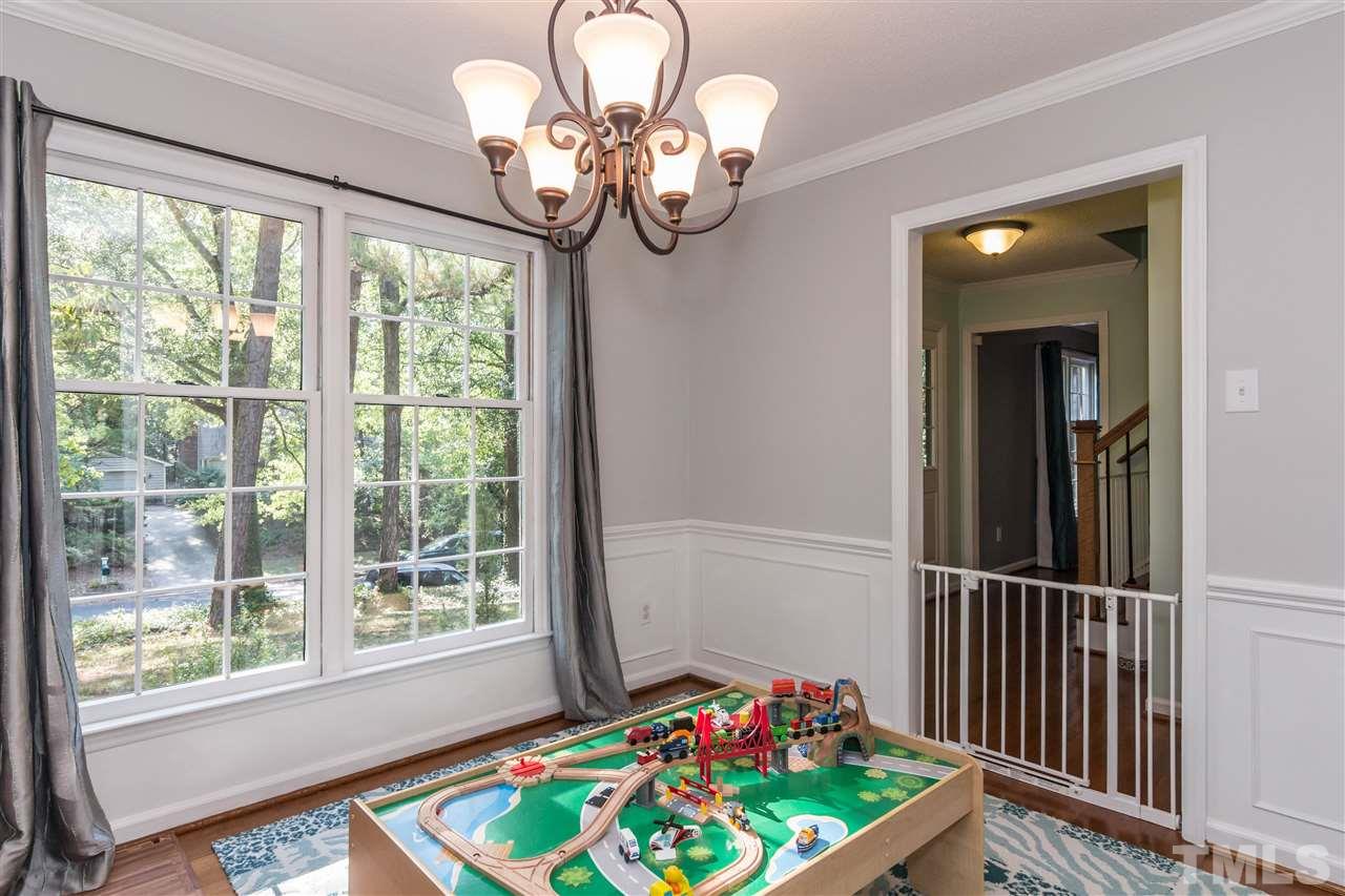 4546 Malvern Road Durham, NC 27707 - Photo 7 of 20 The dining room, also with wood floors, is right next to the kitchen for a fantastic flow. But it can also be used as a play area or office. The abundance of space, offers many options as to how you want to utilize the different rooms.