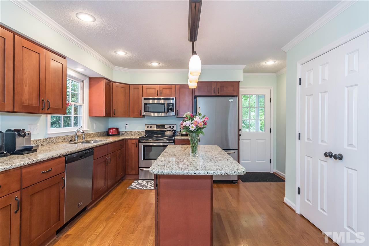 4546 Malvern Road Durham, NC 27707 - Photo 8 of 20 This cooks delight, offers granite counter tops, large pantry, island with pendant lighting and easy flow for cooking or entertaining. The perfect place to prepare those celebratory meals.