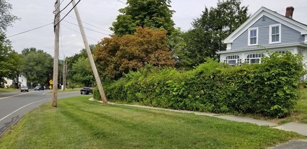 11-13 Colrain Street Greenfield, MA 01301 - Photo 2 of 10 a view of a house with a backyard