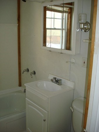 11-13 Colrain Street Greenfield, MA 01301 - Photo 10 of 10 a utility room with dryer and washer