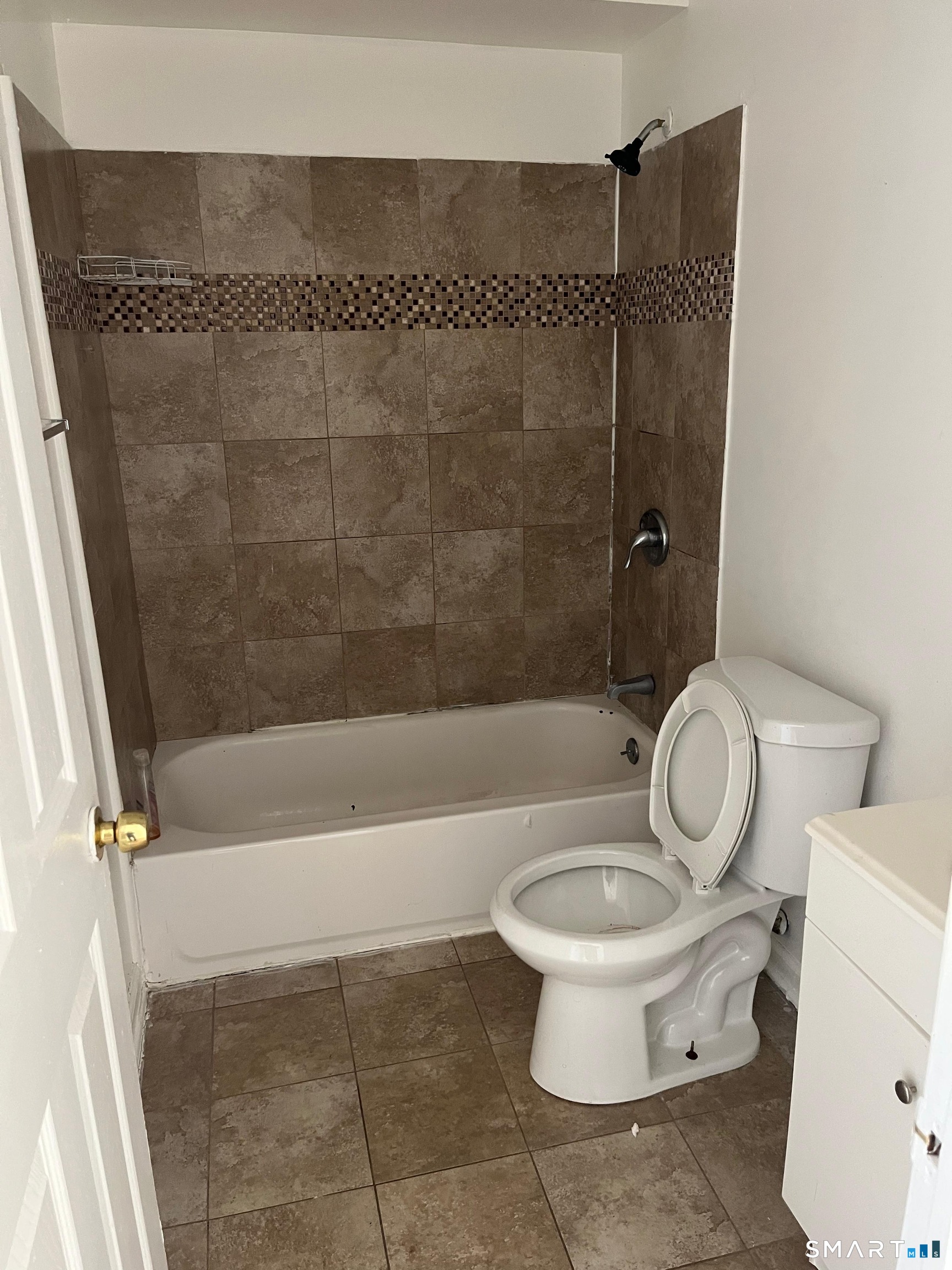 40 Jane Street, Unit 1 Bridgeport, CT 06608 - Photo 5 of 5 a bathroom with a toilet and a shower