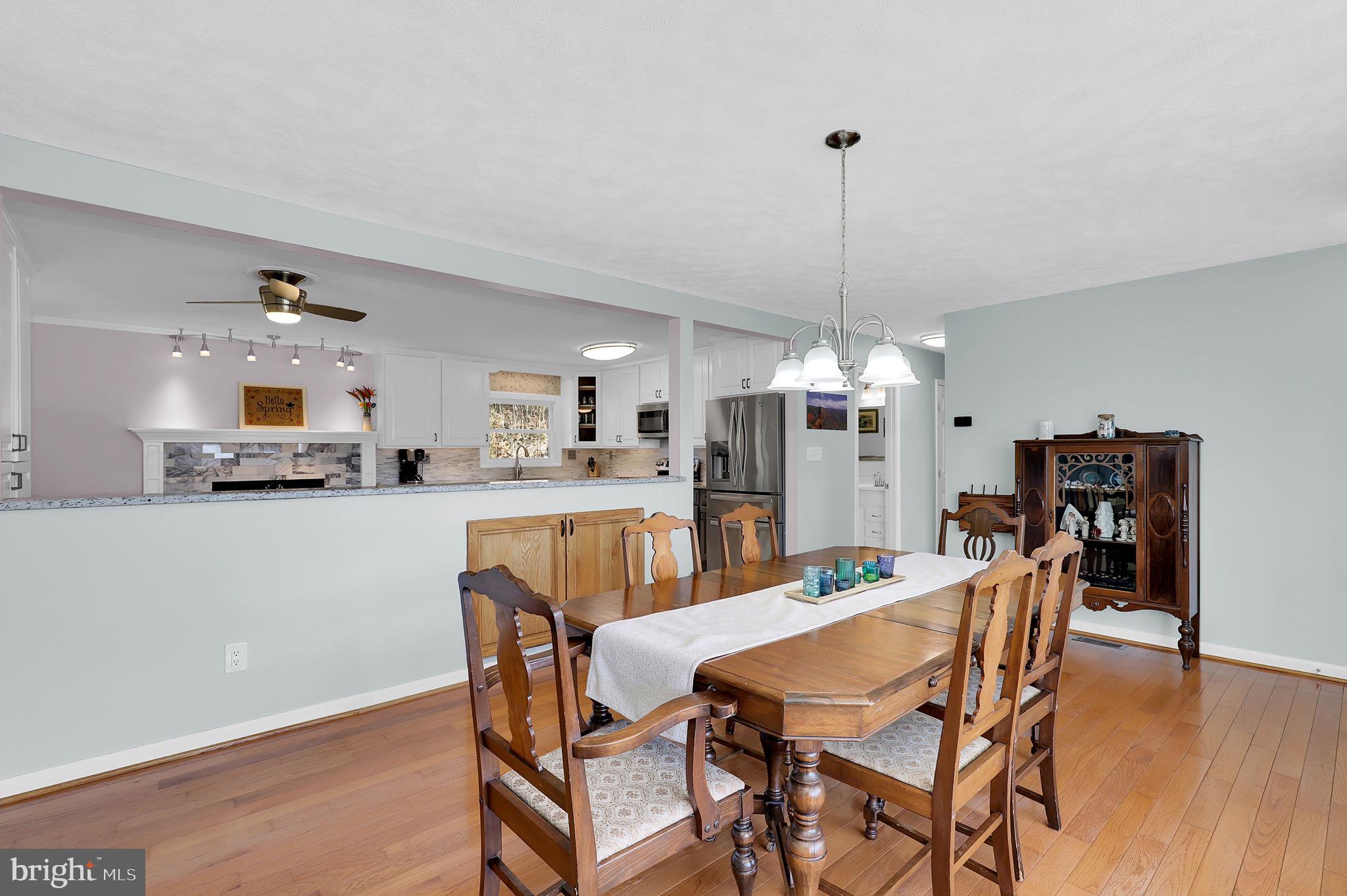 14336 Shirley Bohn Road Mount Airy, MD 21771 - Photo 11 of 56 a dining room with furniture and window
