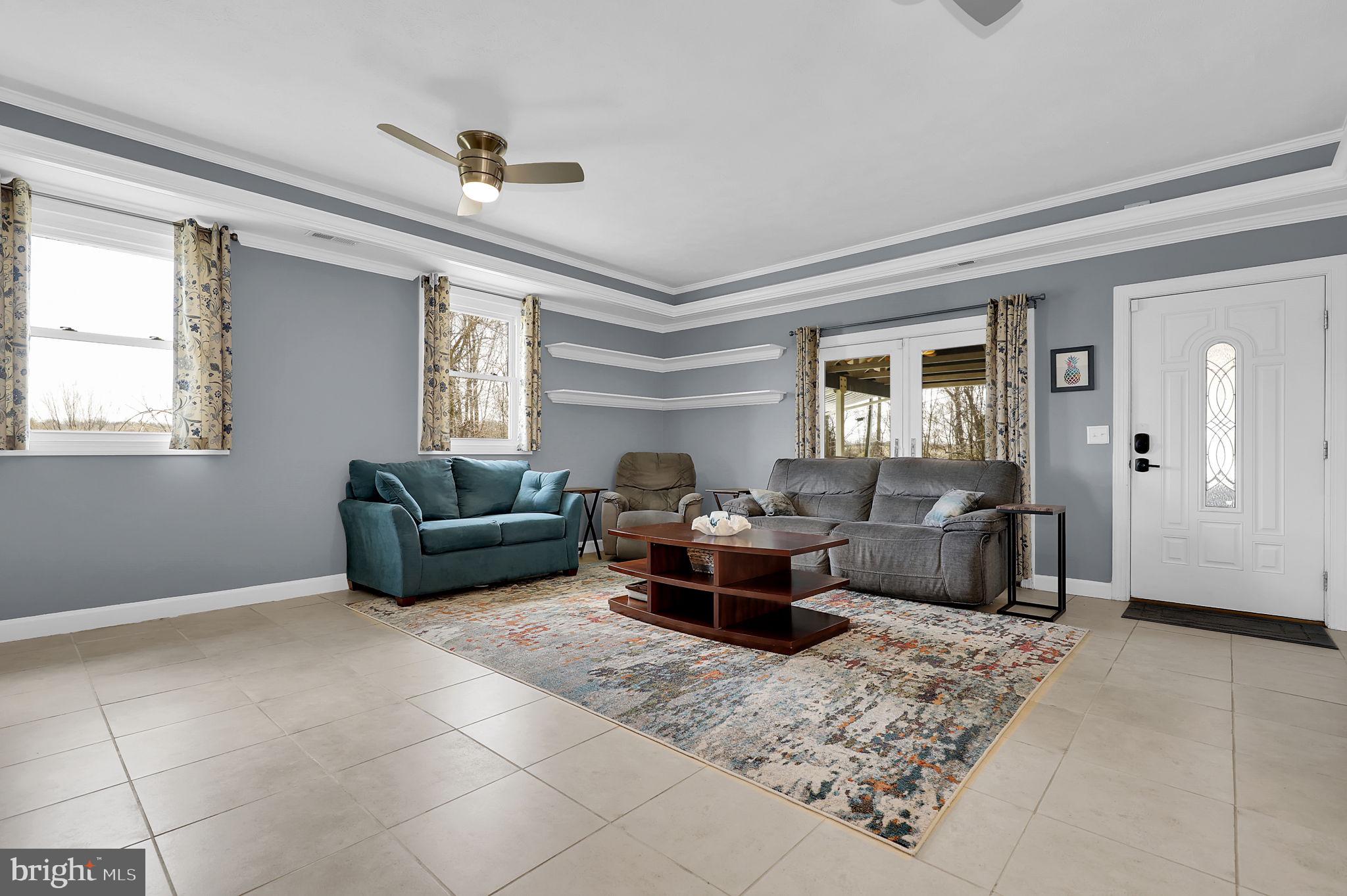 14336 Shirley Bohn Road Mount Airy, MD 21771 - Photo 15 of 56 a living room with furniture and a window