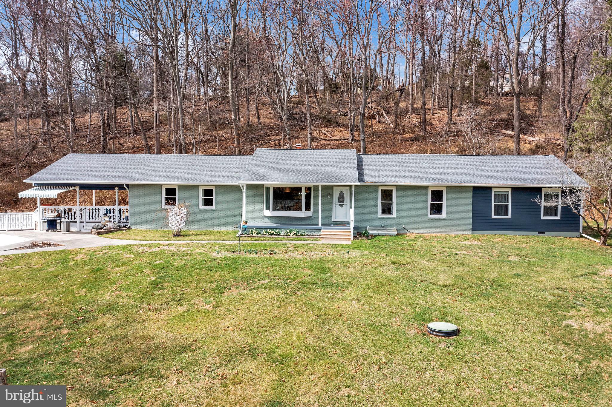 14336 Shirley Bohn Road Mount Airy, MD 21771 - Photo 2 of 56 a front view of a house with a yard