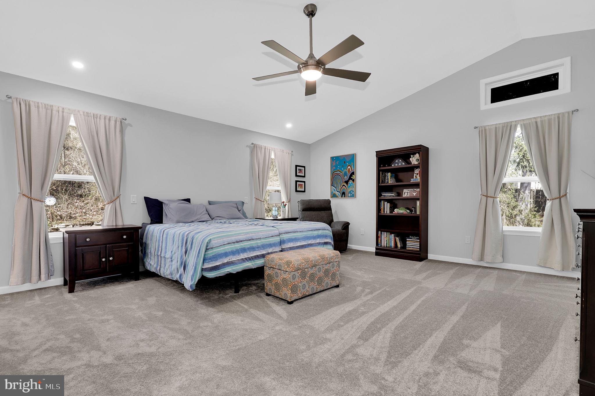 14336 Shirley Bohn Road Mount Airy, MD 21771 - Photo 23 of 56 a spacious bedroom with a bed and window