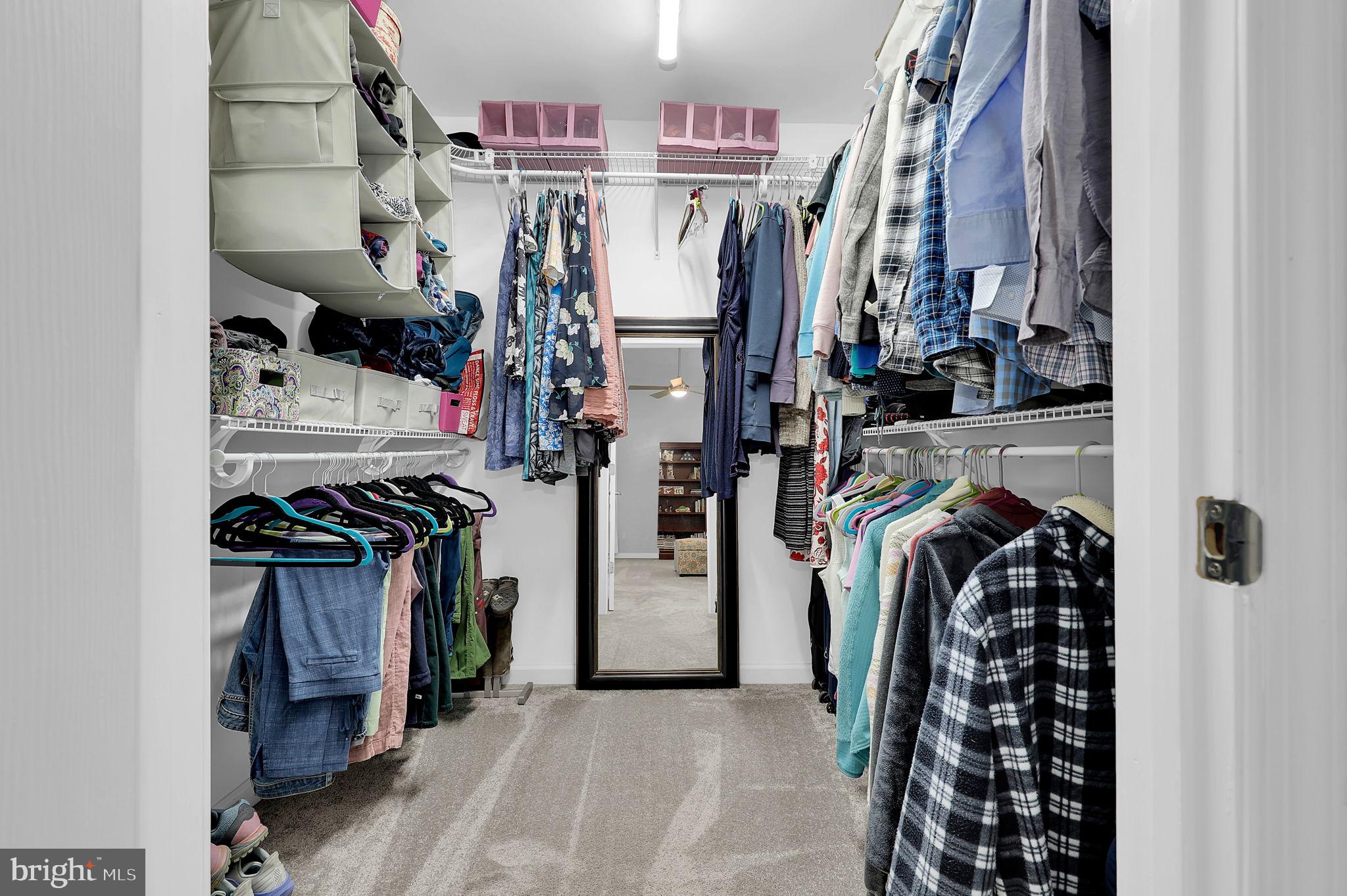 14336 Shirley Bohn Road Mount Airy, MD 21771 - Photo 28 of 56 a view of walk in closet with clothes and shoes