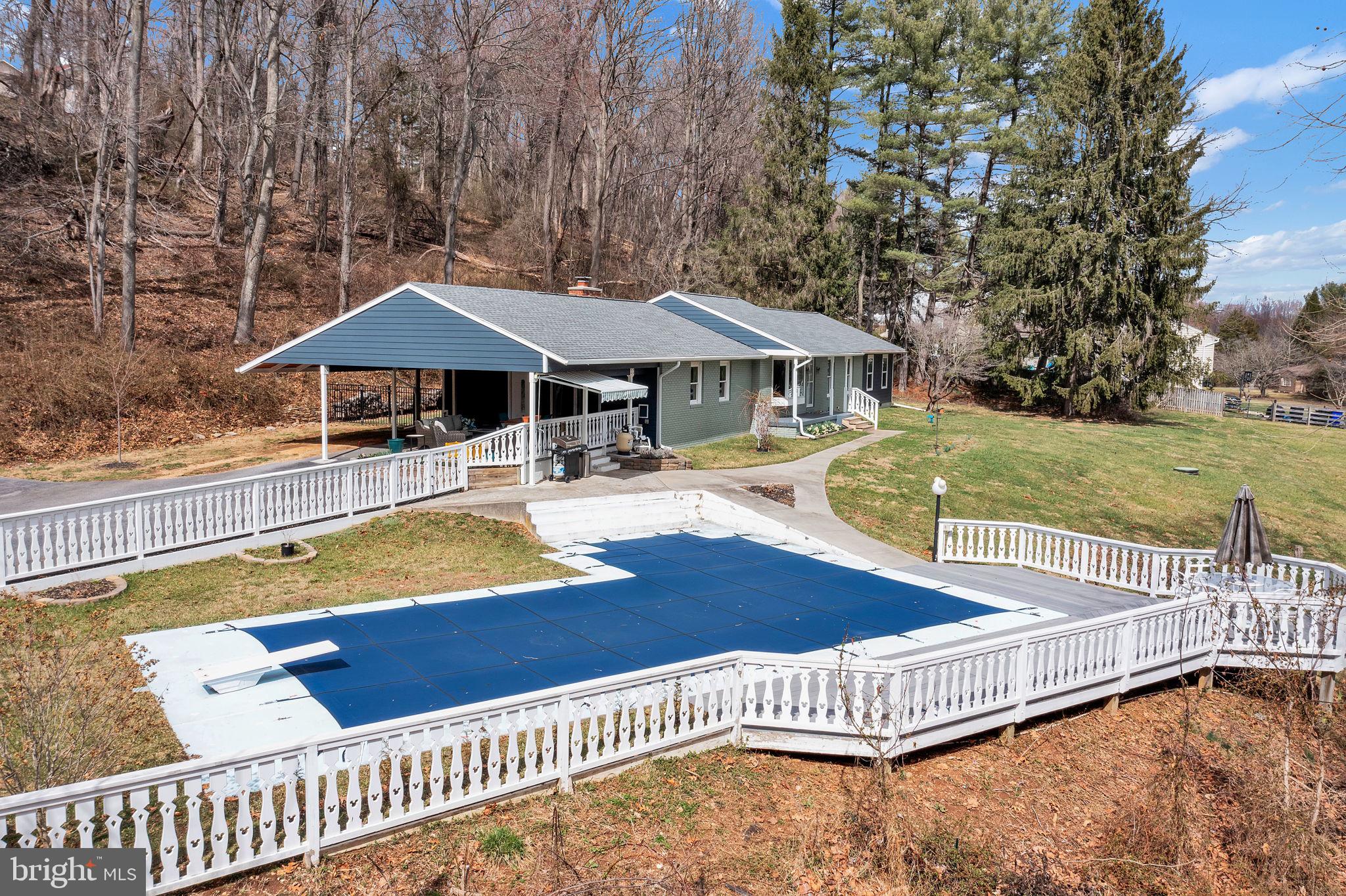 14336 Shirley Bohn Road Mount Airy, MD 21771 - Photo 3 of 56 a view of a house with swimming pool and sitting area