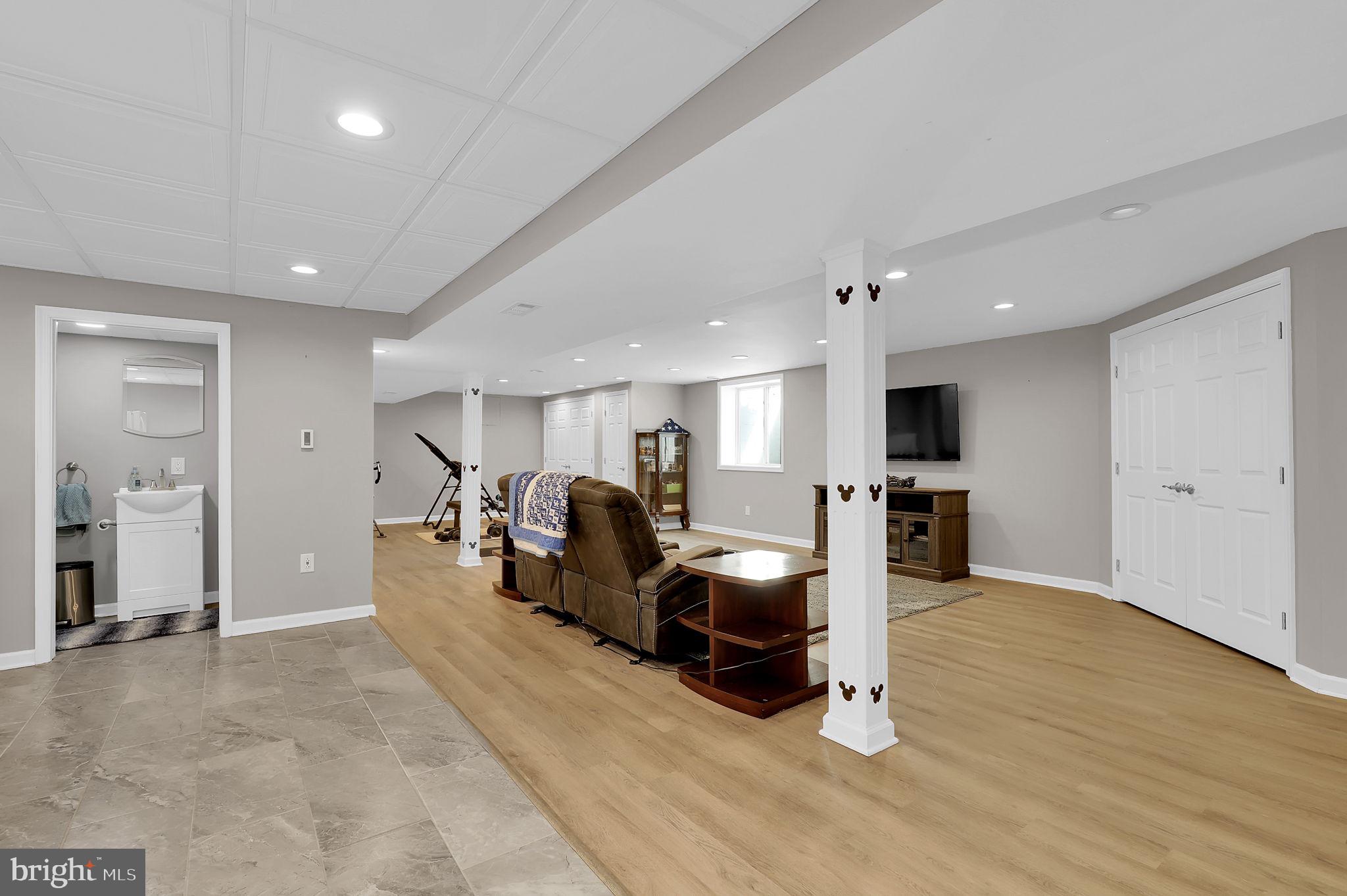 14336 Shirley Bohn Road Mount Airy, MD 21771 - Photo 35 of 56 a view of a room with gym equipment and a large window