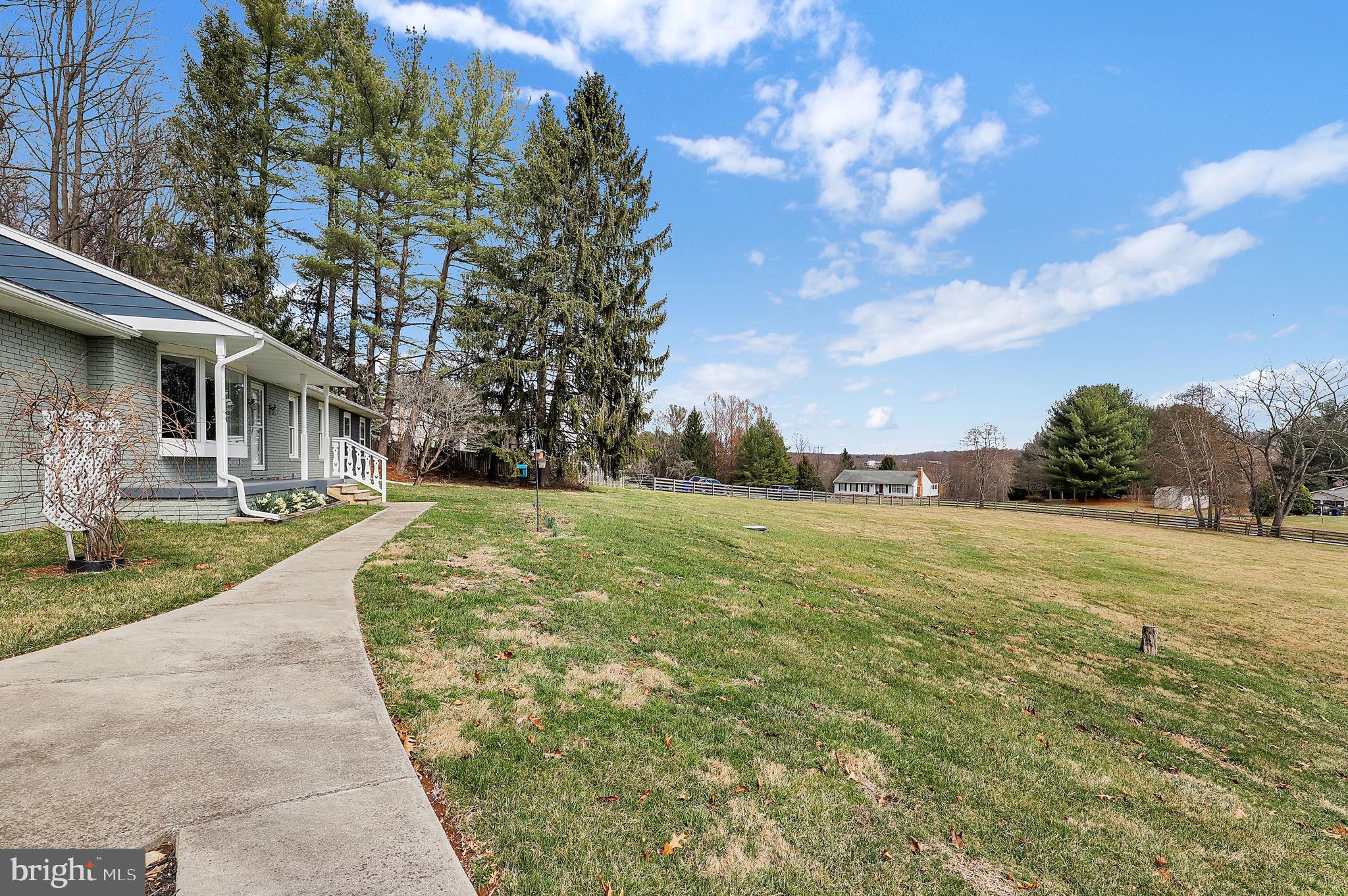 14336 Shirley Bohn Road Mount Airy, MD 21771 - Photo 42 of 56 a view of a house with a yard