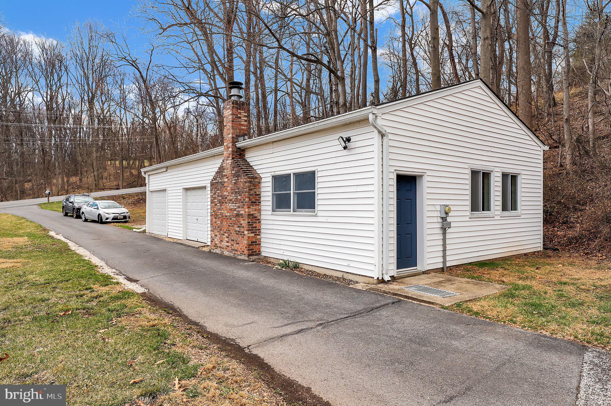 14336 Shirley Bohn Road Mount Airy, MD 21771 - Photo 47 of 56 a view of a house with a yard