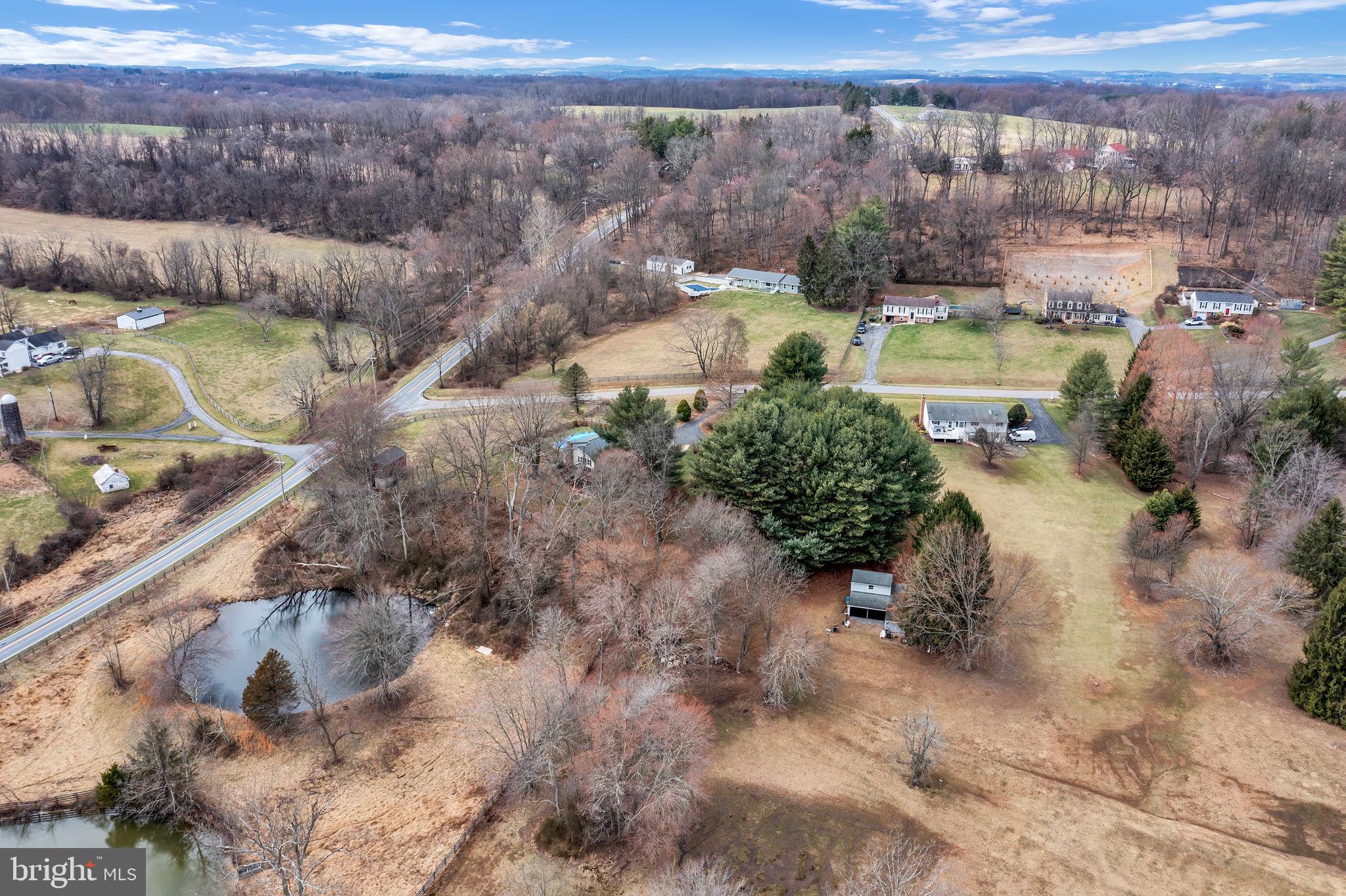 14336 Shirley Bohn Road Mount Airy, MD 21771 - Photo 55 of 56 a view of a lake with a mountain
