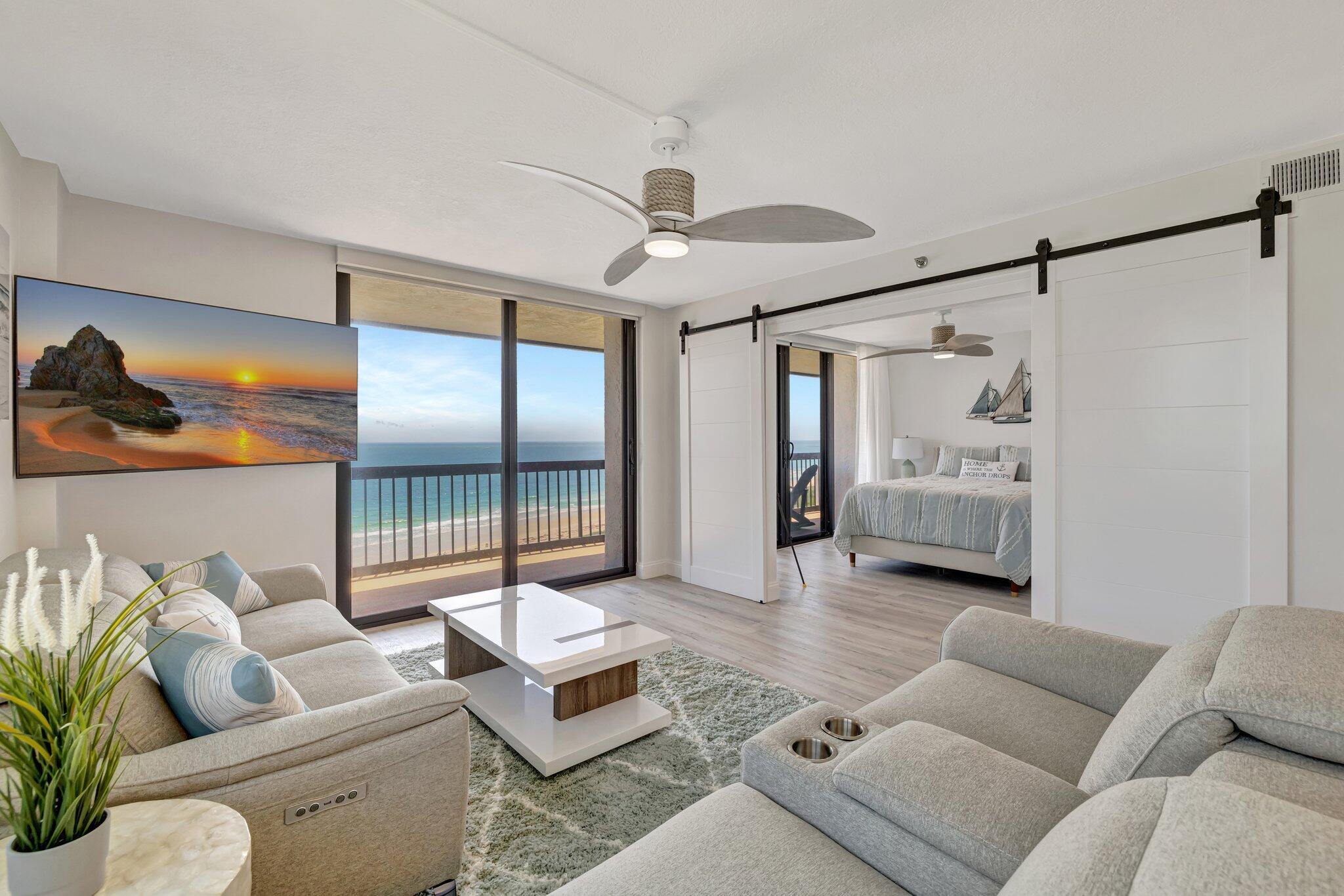 3100 North Hwy A1A, Unit 1102 Hutchinson Island, FL 34949 - Photo 4 of 55 a living room with furniture and a large window