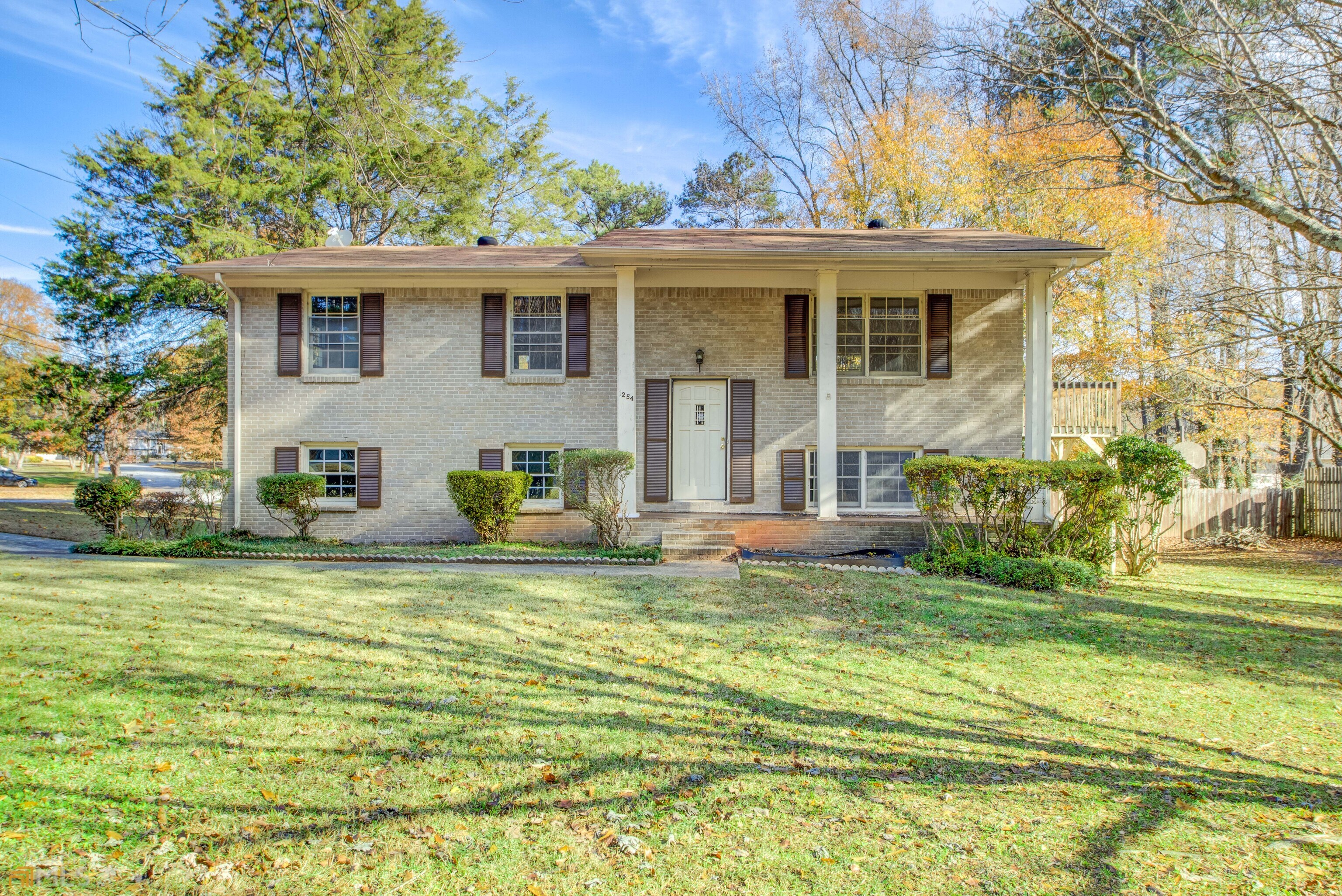 1254 Morrow Road Morrow, GA 30260 - Photo 1 of 1 a view of a house with a swimming pool