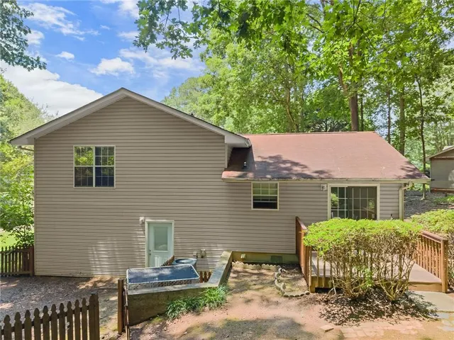 a backyard of a house with seating space