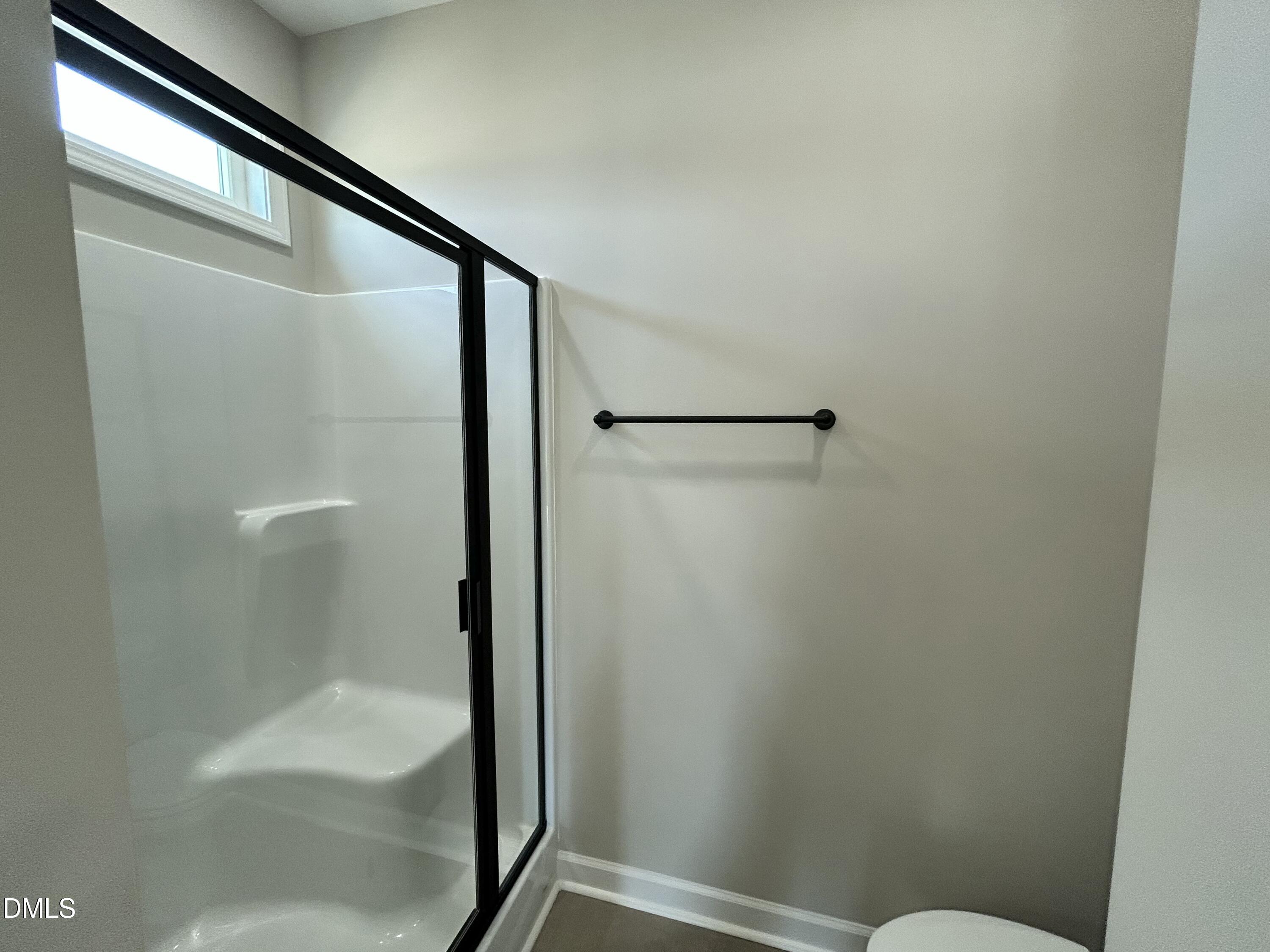 3684 Drew Farmer Road La Grange, NC 28551 - Photo 13 of 18 a bathroom with a glass shower door
