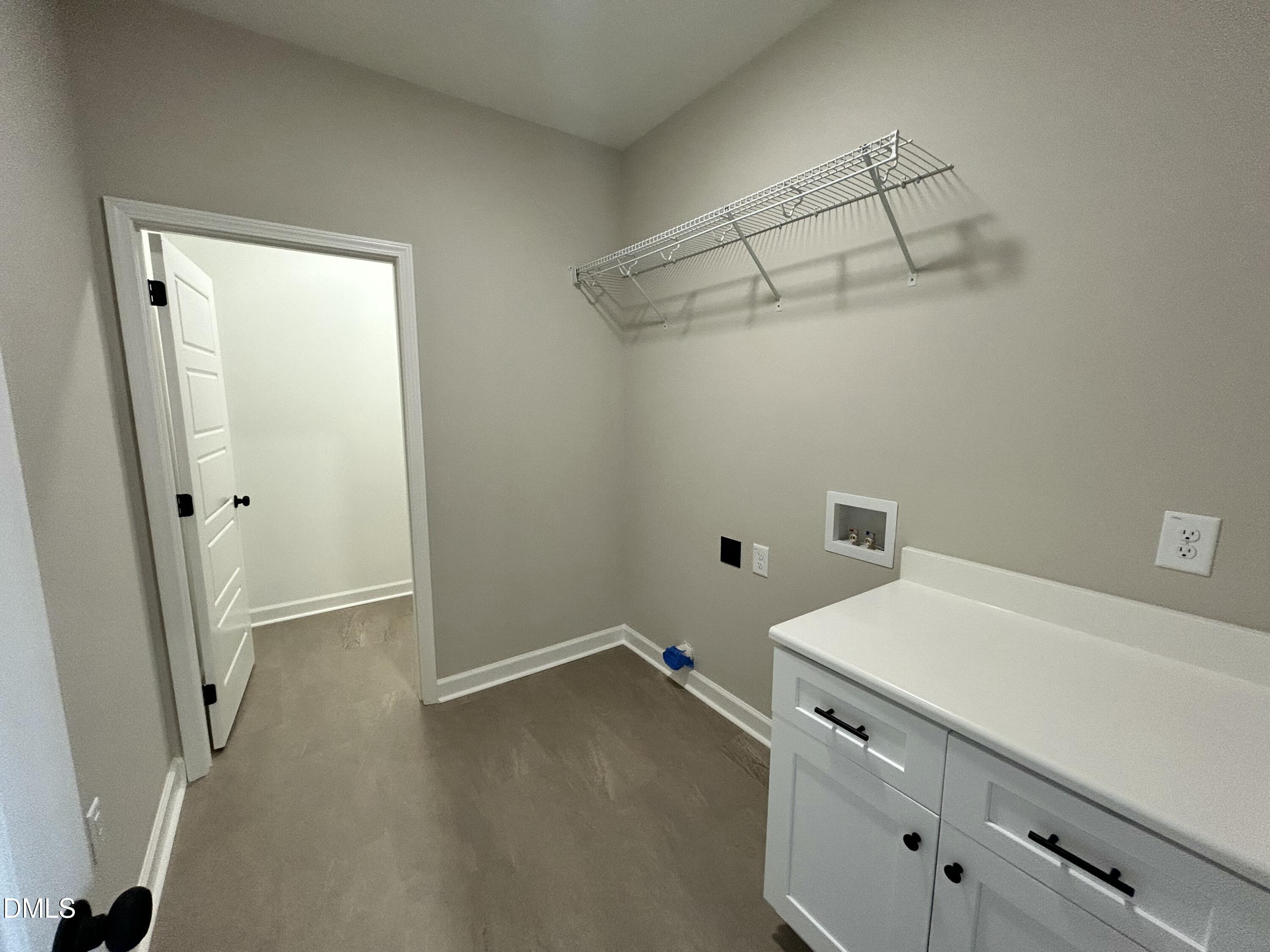 3684 Drew Farmer Road La Grange, NC 28551 - Photo 15 of 18 a view of a room with racks on the wall