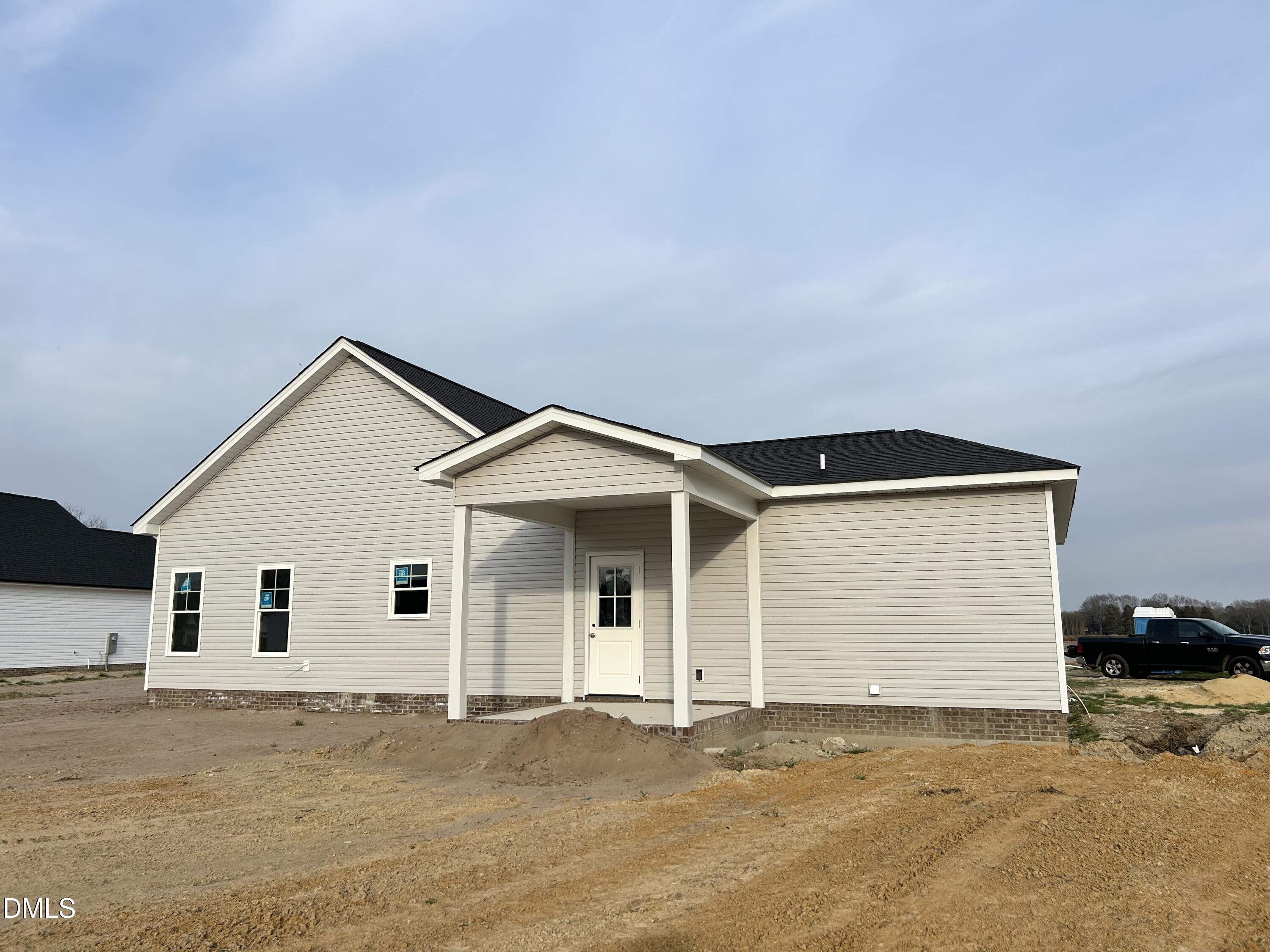 3684 Drew Farmer Road La Grange, NC 28551 - Photo 17 of 18 a front view of a house with a yard and garage