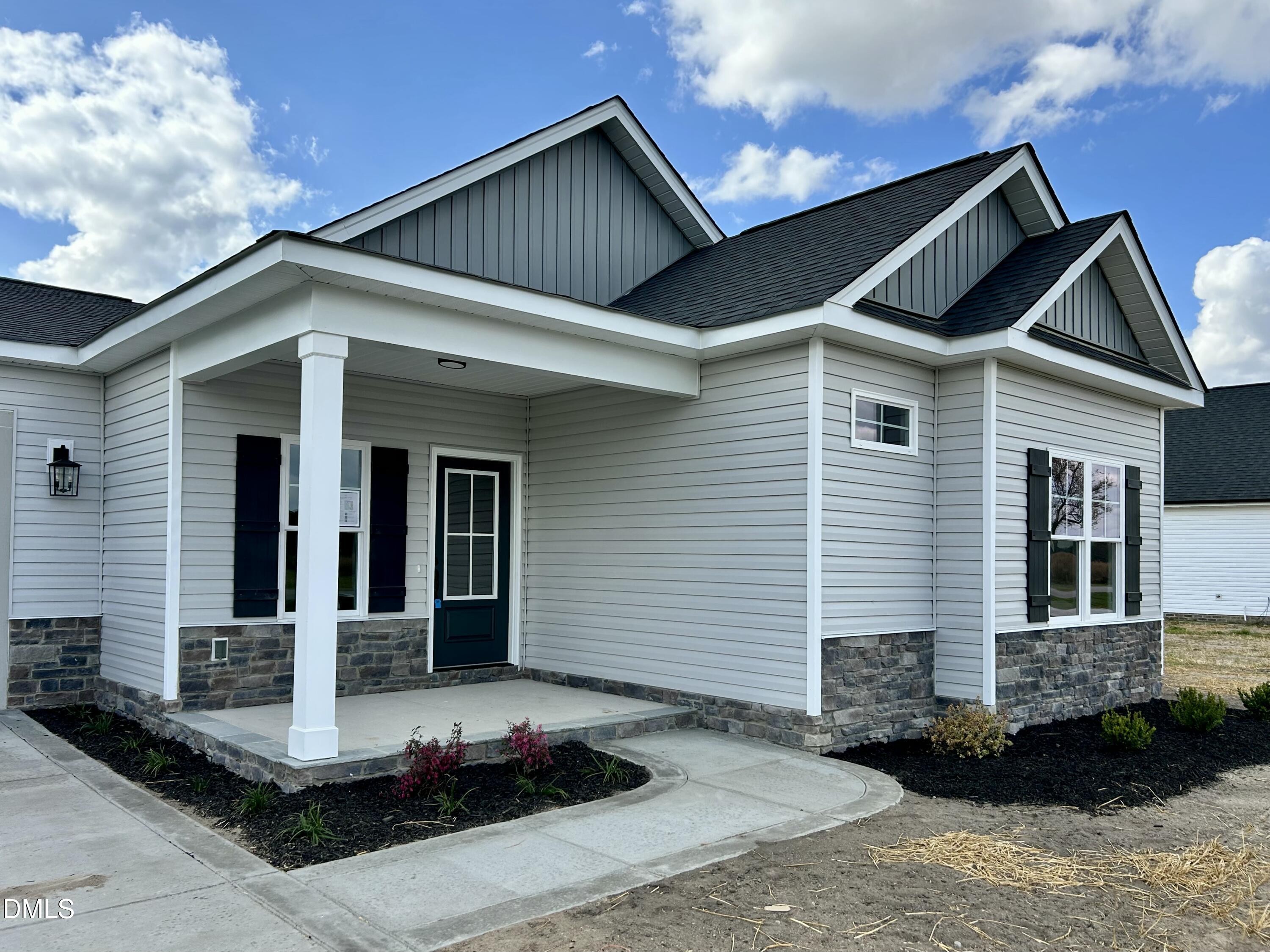 3684 Drew Farmer Road La Grange, NC 28551 - Photo 2 of 18 a front view of a house with garage