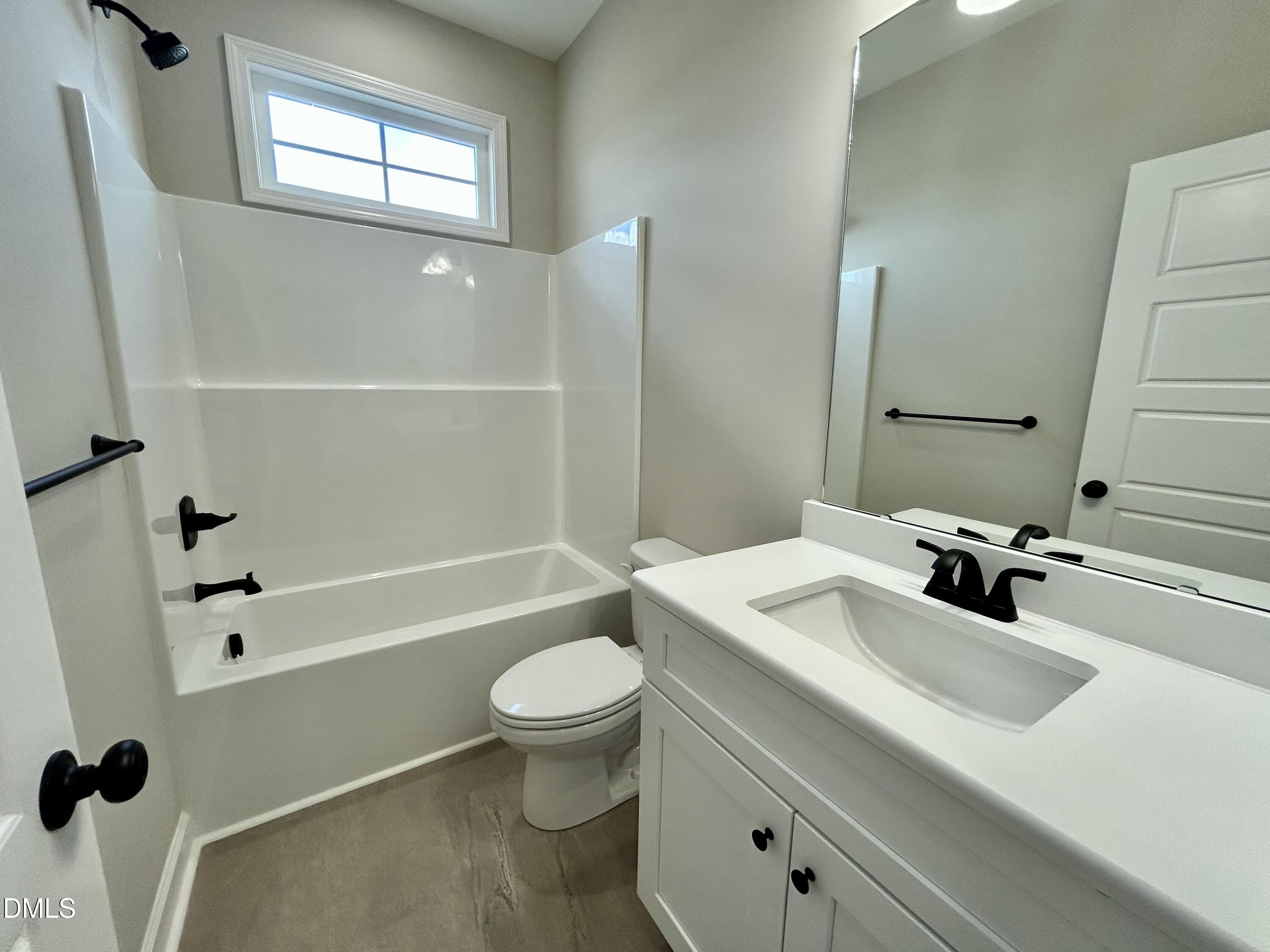 3684 Drew Farmer Road La Grange, NC 28551 - Photo 6 of 18 a bathroom with a sink a toilet and shower