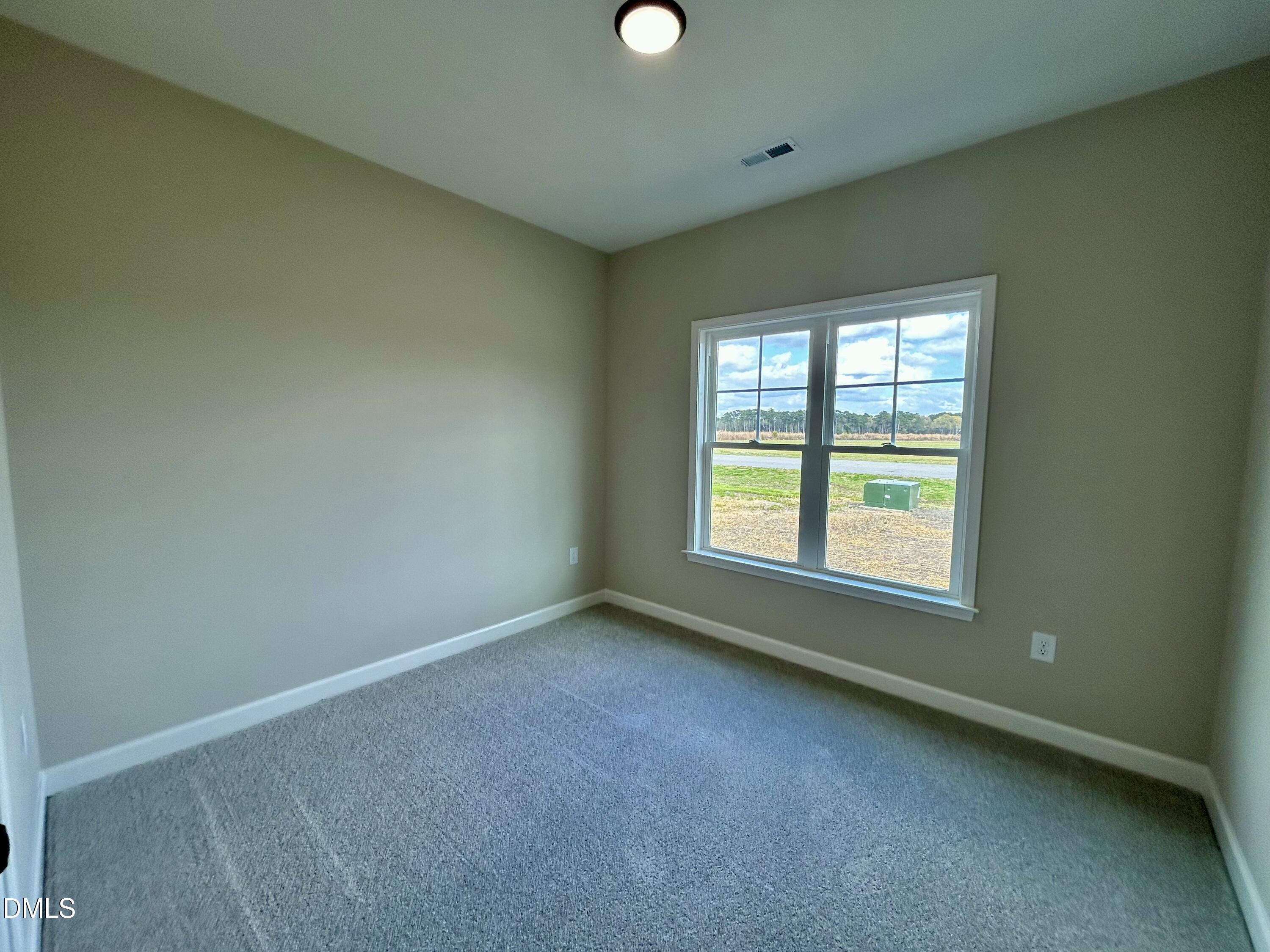 3684 Drew Farmer Road La Grange, NC 28551 - Photo 7 of 18 an empty room with a window