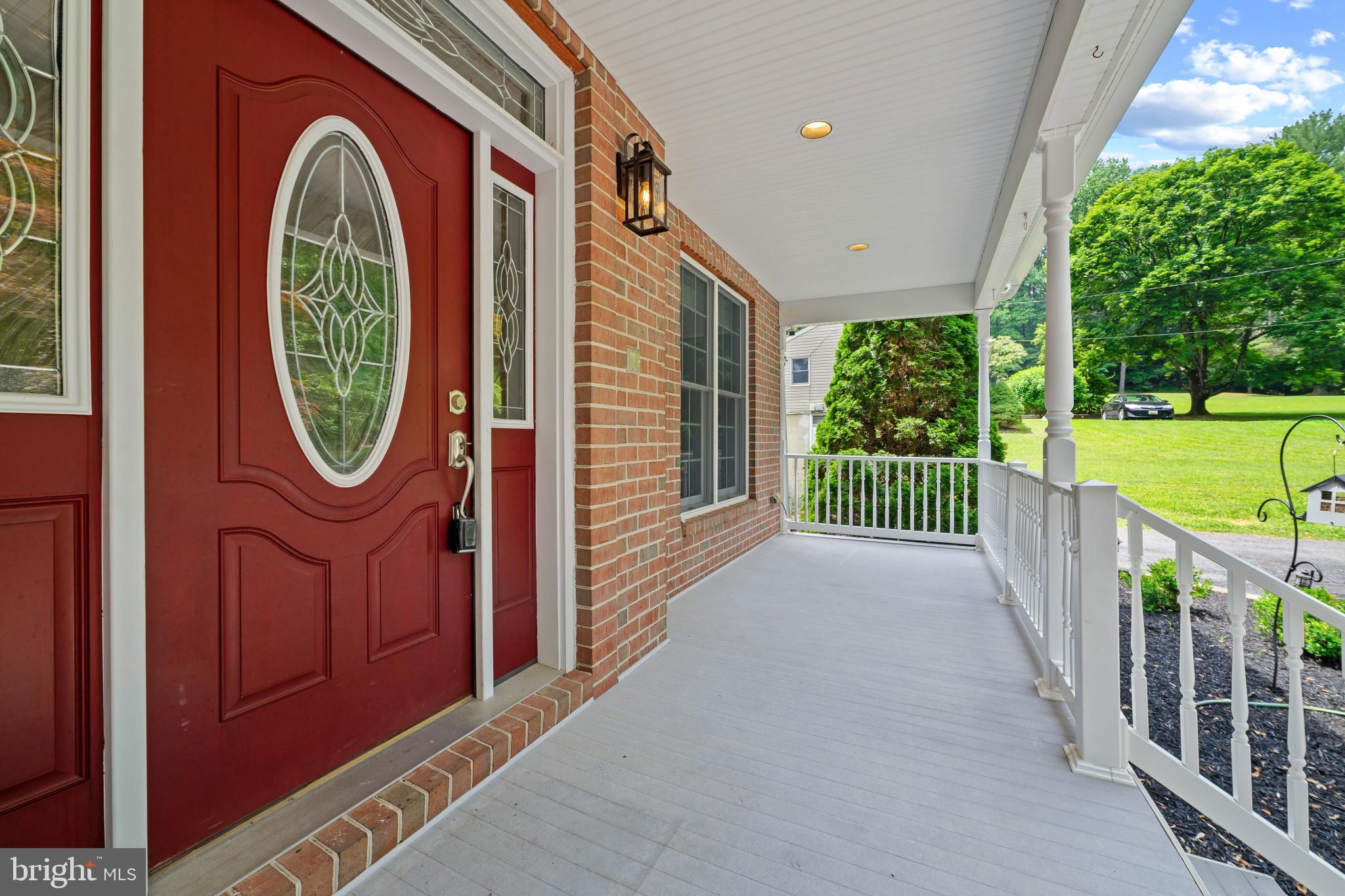 12221 Jerusalem Road Kingsville, MD 21087 - Photo 11 of 66 a view of a pathway of a house with a backyard space and a deck