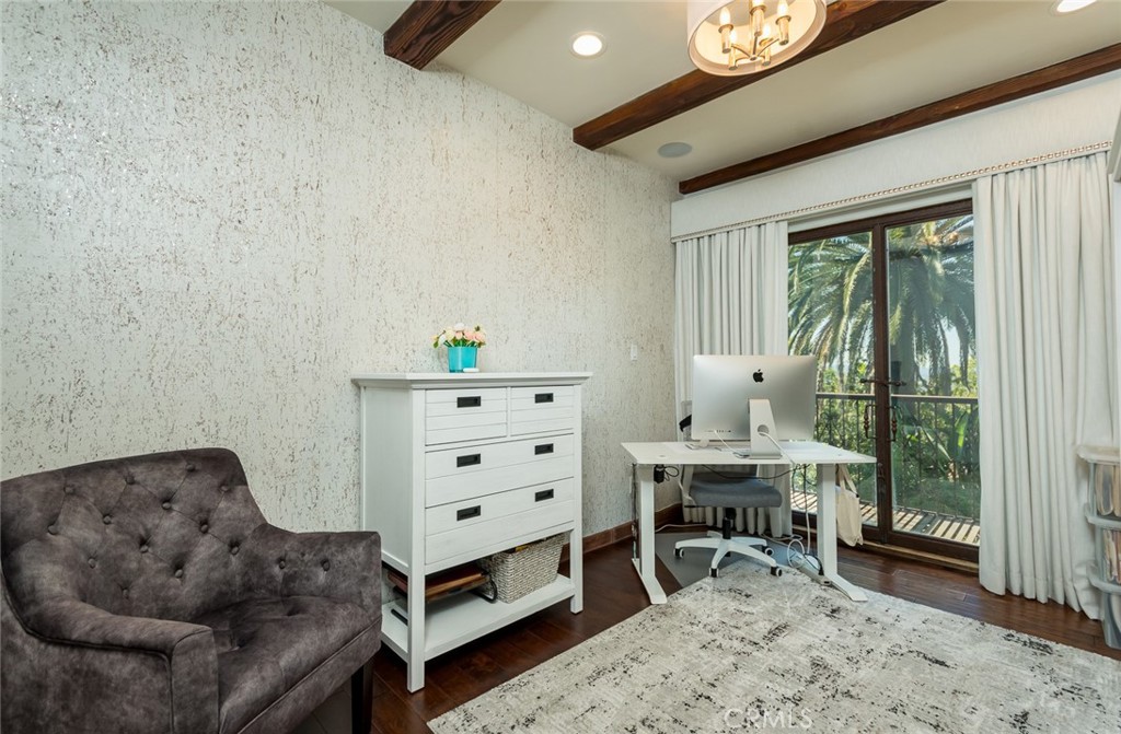 330 Kempton Road Glendale, CA 91202 - Photo 36 of 75 a living room with furniture a window and a table