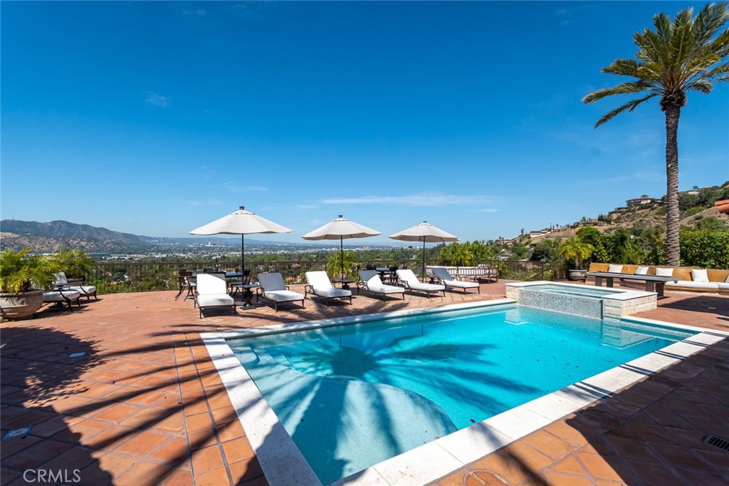 330 Kempton Road Glendale, CA 91202 - Photo 57 of 75 a view of a swimming pool with a patio