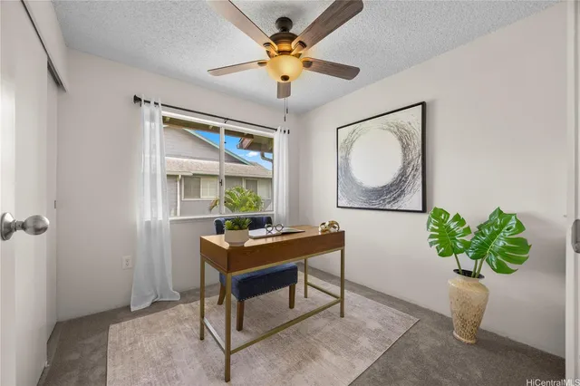 a white toilet sitting next to a bath tub