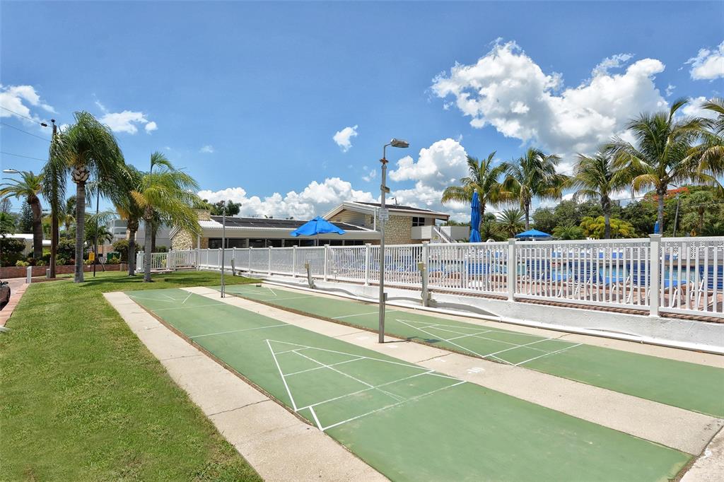 6020 Midnight Pass Road, Unit 63 Sarasota, FL 34242 - Photo 29 of 52 a view of a basket ball ground