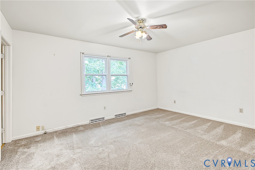 13310 Gladehill Road Chester, VA 23831 - Photo 11 of 41 Expansive room featuring neutral-toned carpeting,