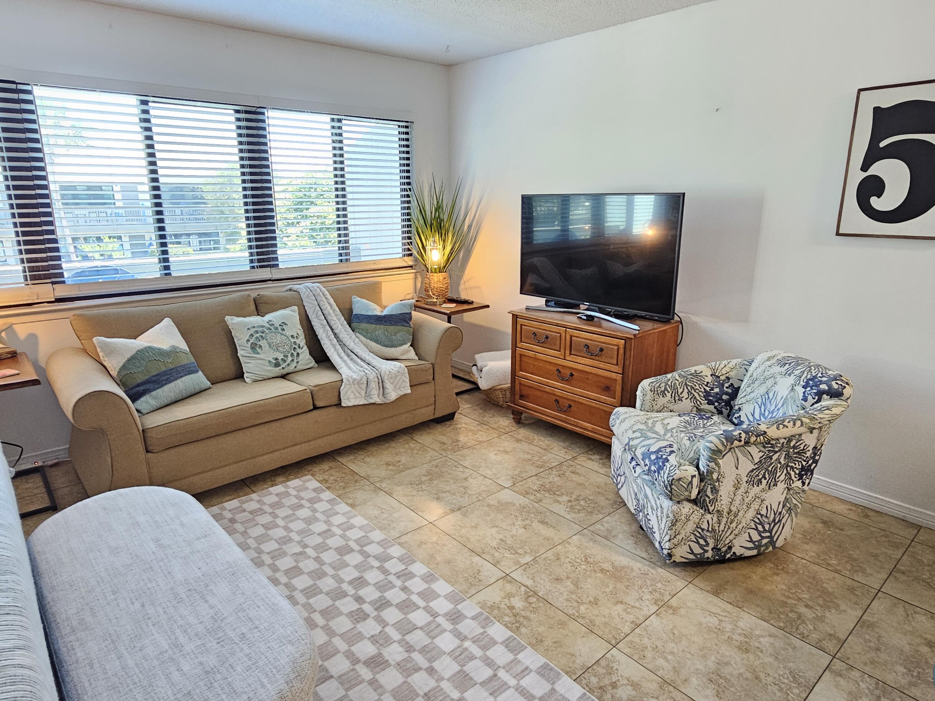 3605 East County Highway 30A, Unit 213 Santa Rosa Beach, FL 32459 - Photo 14 of 31 Living area _ Large Window panel