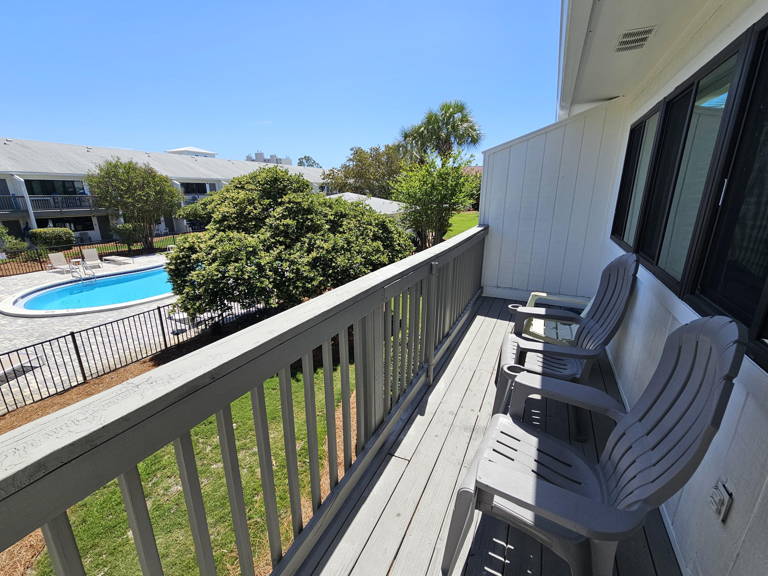 3605 East County Highway 30A, Unit 213 Santa Rosa Beach, FL 32459 - Photo 5 of 31 Balcony with a Pool View