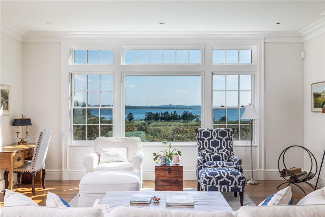 415 Poppasquash Road Bristol, RI 02809 - Photo 16 of 50 Living room overlooking peaceful Usher Cove and the Audubon Society Land.
