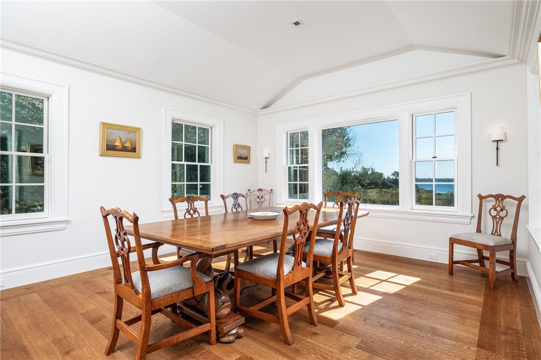 415 Poppasquash Road Bristol, RI 02809 - Photo 22 of 50 Large light filled dining room with more water views is perfect for entertaining.
