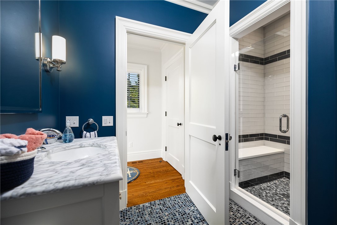 415 Poppasquash Road Bristol, RI 02809 - Photo 29 of 50 First floor guest suite bathroom with amazing tilework.