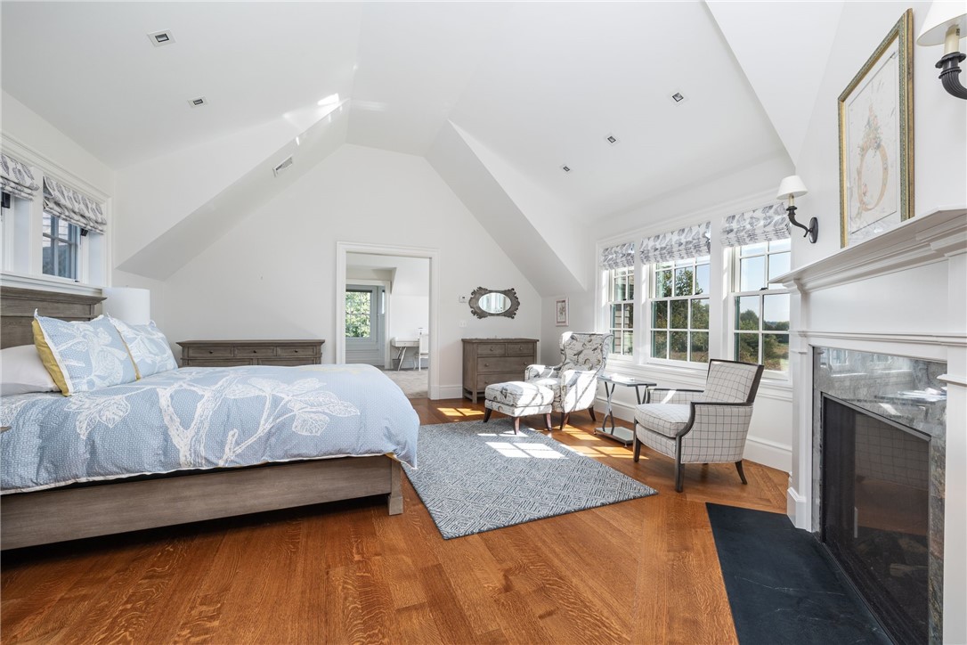 415 Poppasquash Road Bristol, RI 02809 - Photo 31 of 50 The second level master has an en-suite bathroom with a steam shower, soaking tub, and a connected dressing room/office.