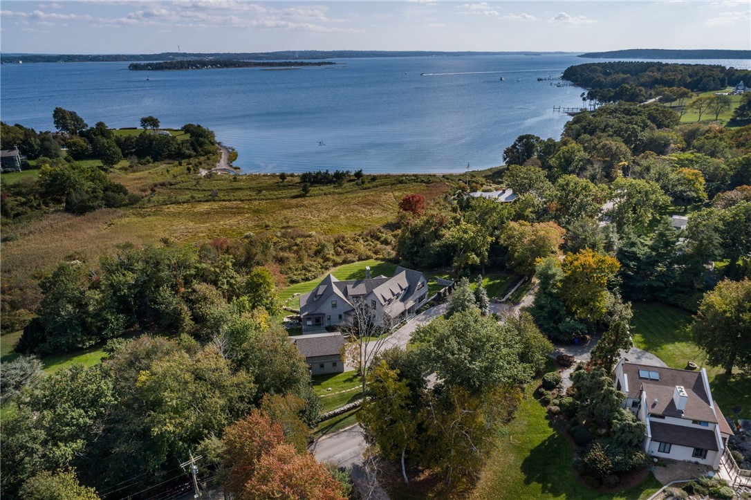 415 Poppasquash Road Bristol, RI 02809 - Photo 9 of 50 Enjoy the peace and tranquility of the views of Usher Cove and the abutting special protected Audubon Society Land.