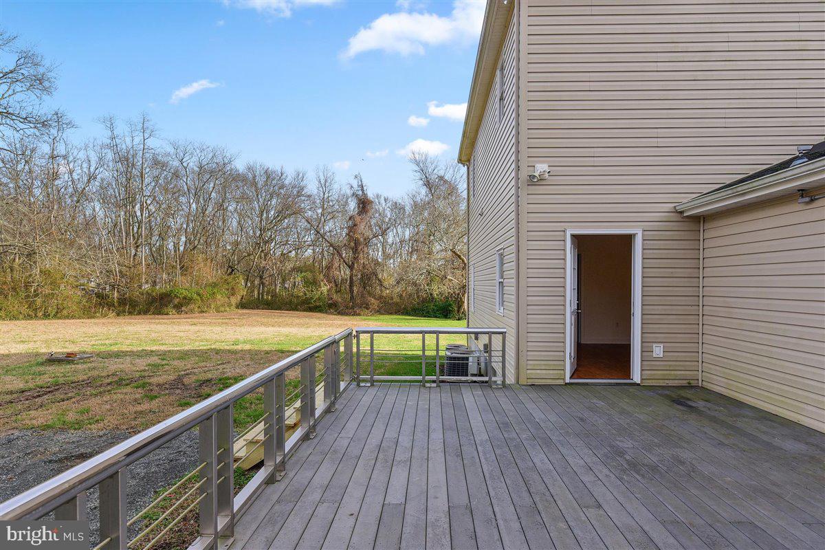 10649 Assateague Road Berlin, MD 21811 - Photo 38 of 39 Huge deck with SS railing